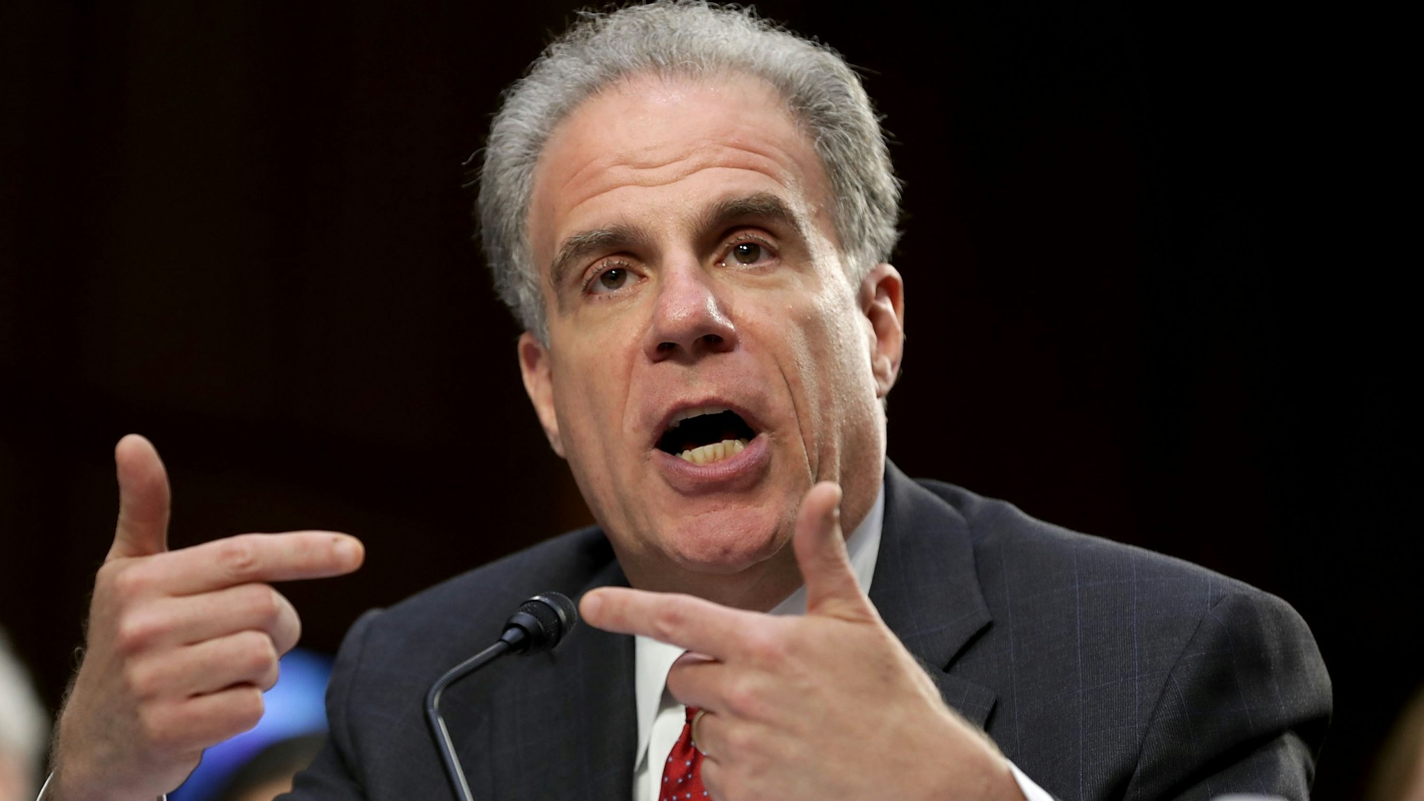 U.S. Justice Department Inspector General Michael Horowitz testifies before the Senate Judiciary Committee in the Hart Senate Office Building on Capitol Hill June 18, 2018 in Washington, DC. According to a report by Horowitz, former FBI Director James Comey and other top officials did not follow standard procedures in their handling of the 2016 investigation into Hillary ClintonÕs email server, but did not find any evidence of political bias.