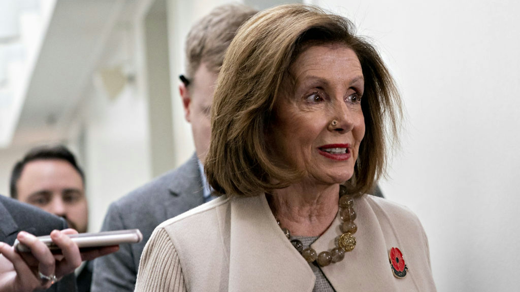 U.S. House Speaker Nancy Pelosi, a Democrat from California, exits after a House Democratic caucus meeting at the U.S. Capitol in Washington, D.C., U.S., on Tuesday, Dec. 17, 2019. The House Rules Committee this morning will begin what could be an all-day meeting to write the procedures for the floor debate and vote on impeachment of President Donald Trump. Photographer: Andrew Harrer/Bloomberg