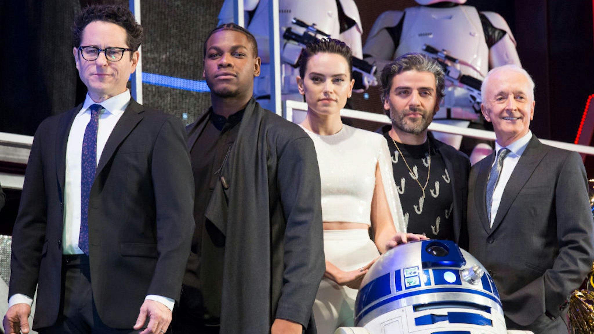 J.J. Abrams, John Boyega, Daisy Ridley, Oscar Isaac and Anthony Daniels witrh Star Wars character R2-D2 attend the special fan event for 'Star Wars: The Rise of Skywalker' at Roppongi Hills on December 11, 2019 in Tokyo, Japan. (Photo by Yuichi Yamazaki/Getty Images)