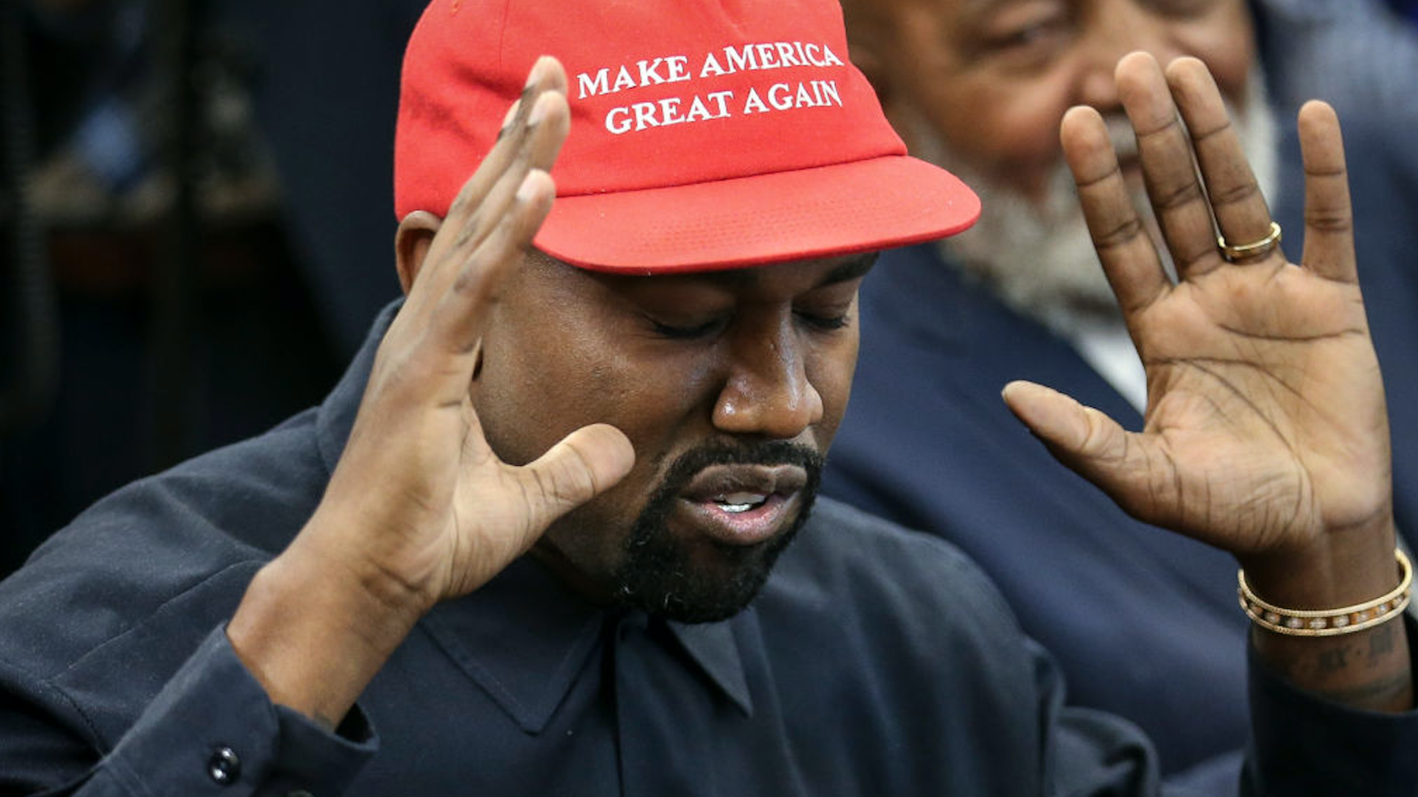 Rapper Kanye West speaks during a meeting with U.S. President Donald Trump in the Oval office of the White House on October 11, 2018 in Washington, DC.