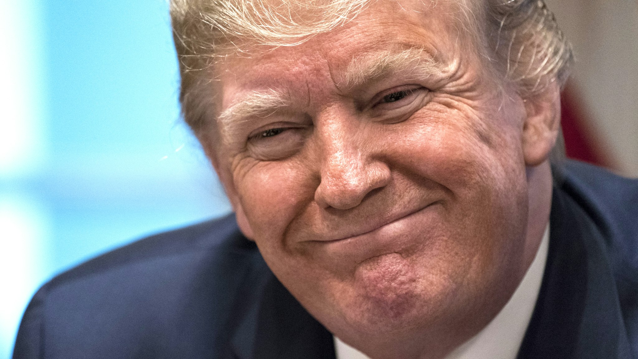 U.S. President Donald Trump smiles during a round table meeting on education in Washington, D.C., U.S., on Monday, Dec. 9, 2019. The Federal Bureau of Investigation acted properly when it began a broad investigation into whether then-candidate Trump or people around him conspired with Russia to interfere in the 2016 election, according to the Justice Department's inspector general.