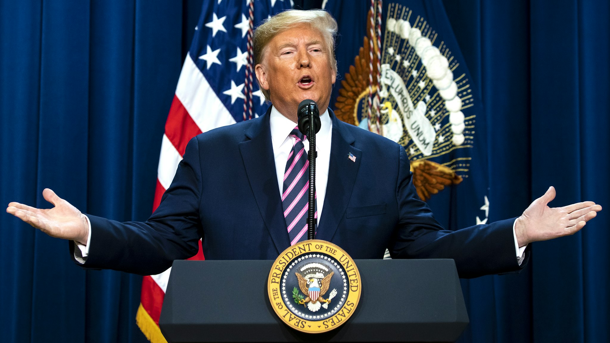 U.S. President Donald Trump speaks during an event at the Eisenhower Executive Office Building in Washington, D.C., U.S., on Thursday, Dec. 19, 2019. The summit was set to discuss mental health treatment as a way to combat homelessness, violence and substance abuse.
