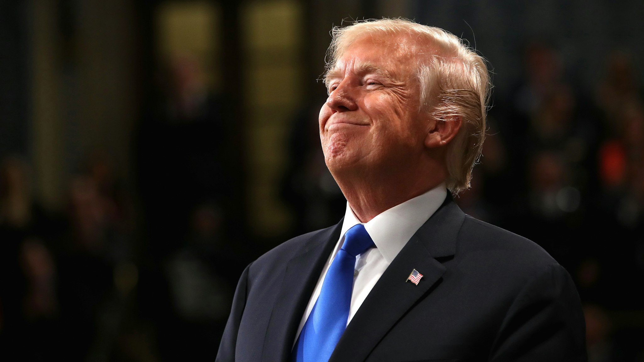 WASHINGTON, DC - JANUARY 30: U.S. President Donald J. Trump smiles during the State of the Union address in the chamber of the U.S. House of Representatives January 30, 2018 in Washington, DC. This is the first State of the Union address given by U.S. President Donald Trump and his second joint-session address to Congress.