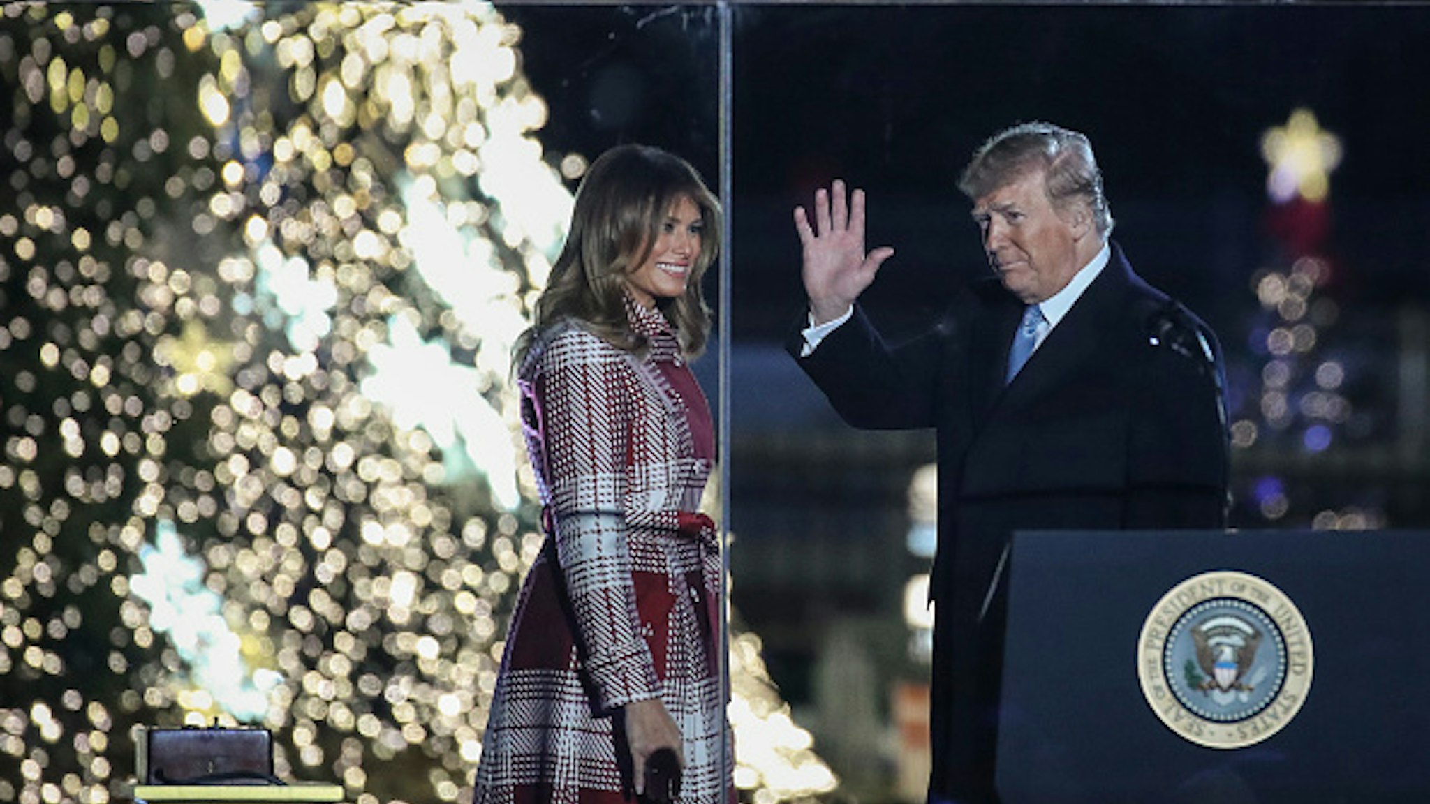WASHINGTON, DC - DECEMBER 5: U.S. President Donald Trump and first lady Melania Trump attend the National Christmas Tree lighting ceremony held by the National Park Service at the Ellipse near the White House, on December 5, 2019 in Washington, DC. This year's National Christmas Tree is a 30-foot Colorado blue spruce from Pennsylvania and is adorned with 50,000 lights and 450 stars.