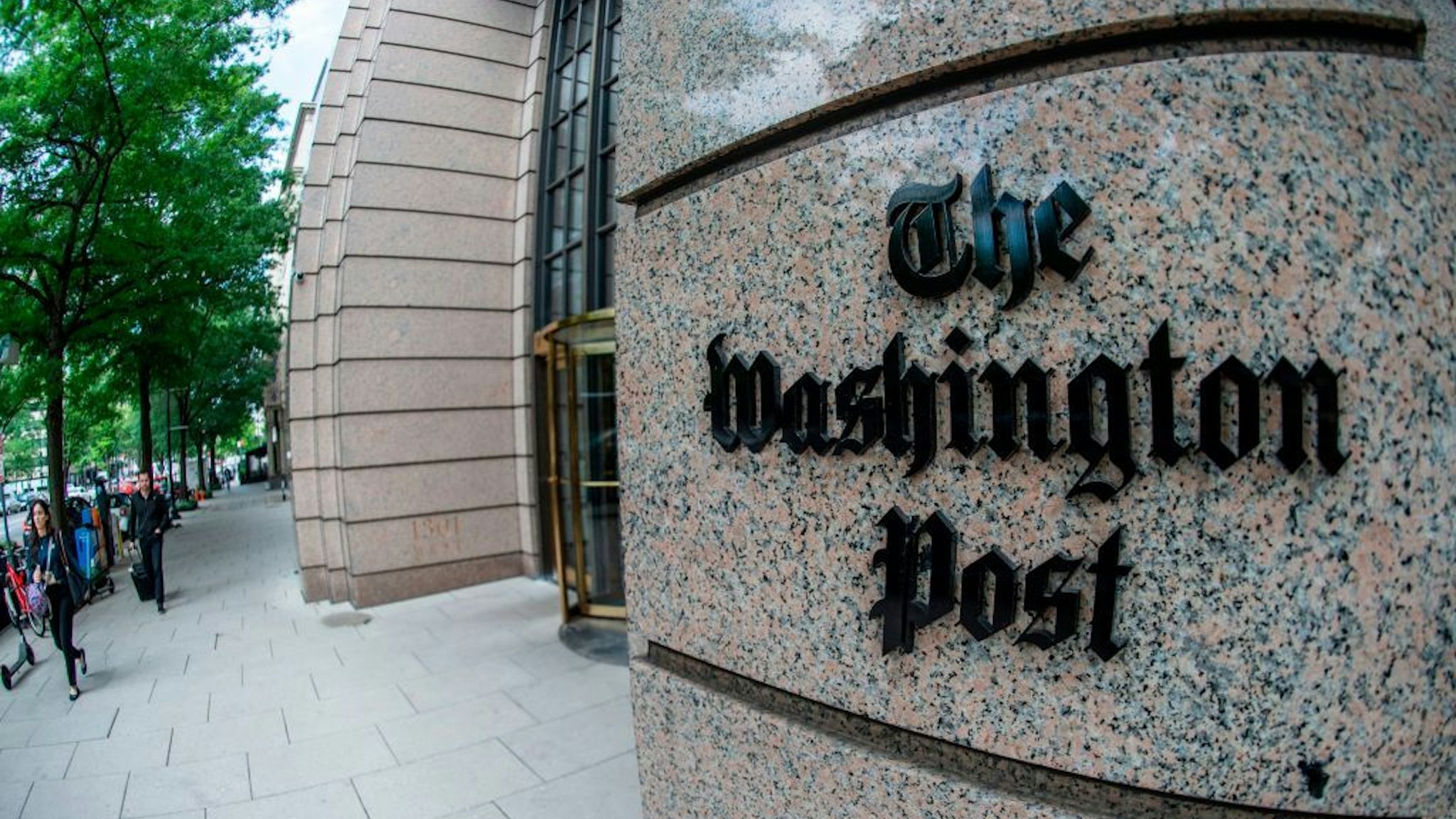 The building of the Washington Post newspaper headquarter is seen on K Street in Washington DC on May 16, 2019. - The Washington Post is a major American daily newspaper published in Washington, D.C., with a particular emphasis on national politics and the federal government. It has the largest circulation in the Washington metropolitan area. (Photo by Eric BARADAT / AFP) (Photo credit should read ERIC BARADAT/AFP via Getty Images)