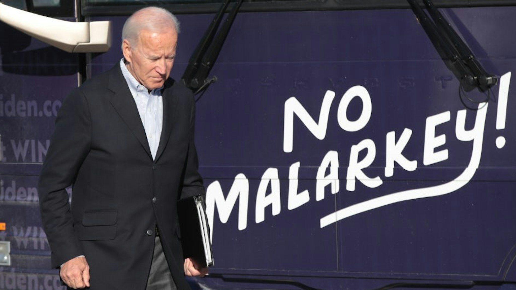 Democratic presidential candidate, former Vice President Joe Biden arrives at a campaign stop on December 2, 2019 in Emmetsburg, Iowa. The stop was part of his 650-mile "No Malarkey" campaign bus trip through rural Iowa. The 2020 Iowa Democratic caucuses will take place on February 3, 2020, making it the first nominating contest for the Democratic Party in choosing their presidential candidate to face Donald Trump in the 2020 election.