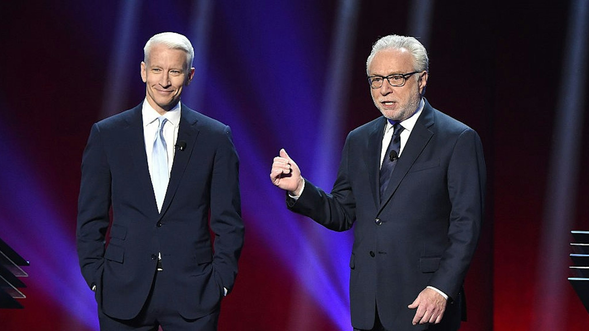 Anderson Cooper and Wolf Blitzer appear on stage during Turner Upfront 2016 show at The Theater at Madison Square Garden on May 18, 2016 in New York City.