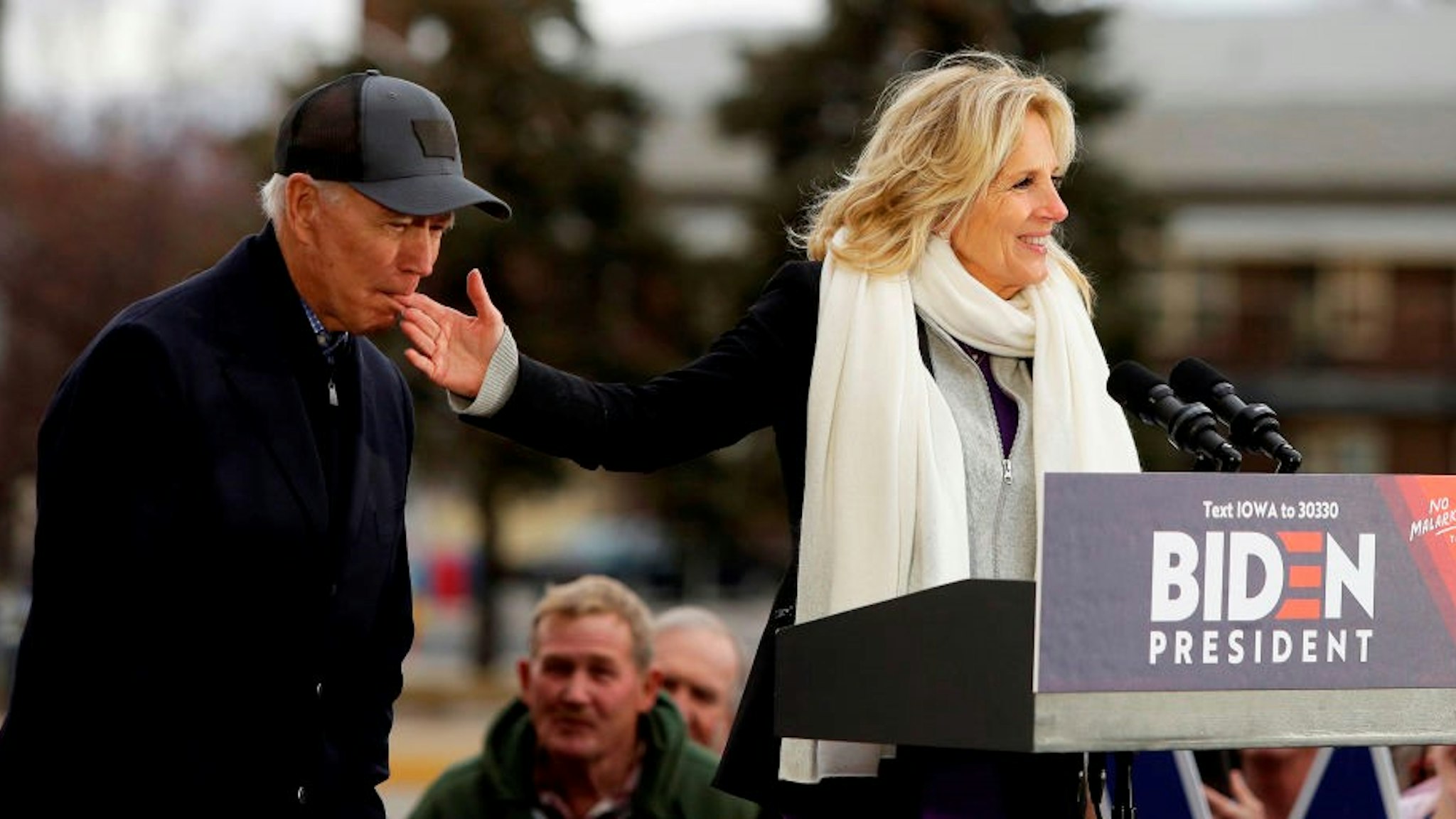Democratic presidential candidate, former Vice President Joe Biden bites the finger of his wife Jill Biden as she introduces him during a campaign event on November 30, 2019 in Council Bluffs, Iowa. Biden, who begins his eight-day bus tour across Iowa on Saturday, once lead the state in the polls but now trails presidential candidates Pete Buttigieg and Elizabeth Warren with just under 3 months until the 2020 Iowa Democratic caucuses.