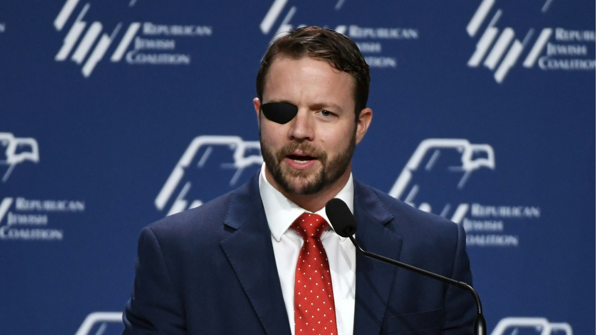 U.S. Rep. Dan Crenshaw (R-TX) speaks at the Republican Jewish Coalition's annual leadership meeting at The Venetian Las Vegas after appearances by U.S. President Donald Trump and Vice President Mike Pence on April 6, 2019 in Las Vegas, Nevada.