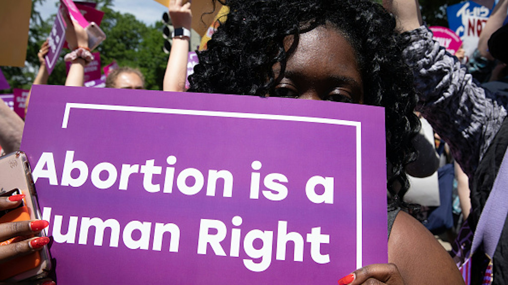 Abortionrights activist gathered outside the U.S. Supreme Court to protest against the recent abortion laws passed across the country in recent weeks. Tuesday, May 21, 2019.