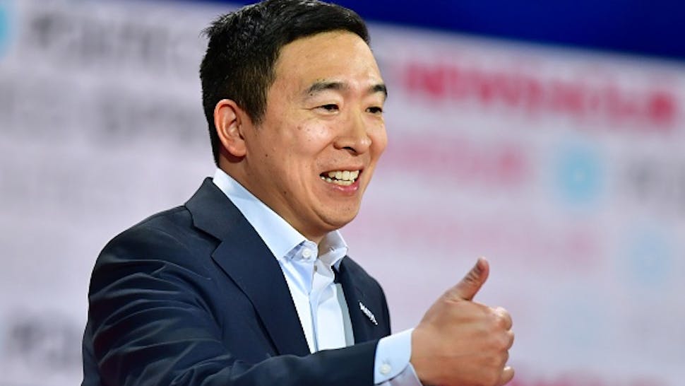 US-VOTE-2020-DEMOCRATS-DEBATE Democratic presidential hopeful entrepreneur Andrew Yang gestures during the sixth Democratic primary debate of the 2020 presidential campaign season co-hosted by PBS NewsHour & Politico at Loyola Marymount University in Los Angeles, California on December 19, 2019.