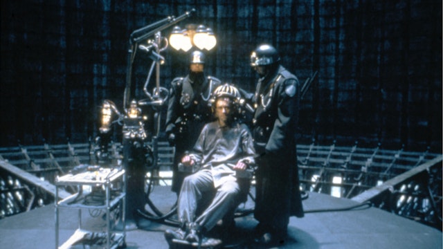 Welsh actor Jonathan Pryce on the set of Brazil, written and directed by Terry Gilliam.