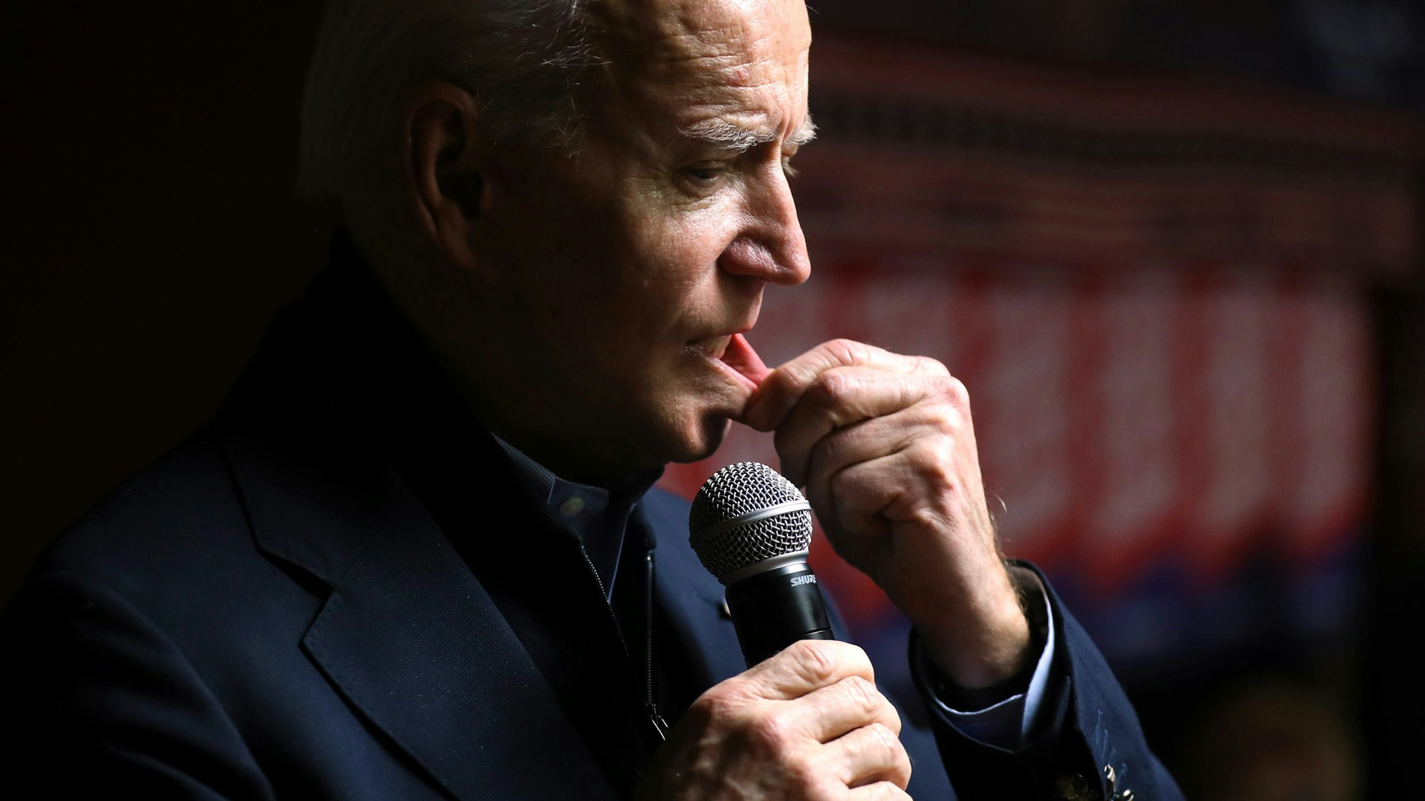 DAVENPORT, IOWA - JANUARY 28: Democratic presidential candidate, former Vice President Joe Biden talks to campaign volunteers during a stop at Jeno's Little Hungary January 28, 2020 in Davenport, Iowa. The Iowa caucuses are February 3.