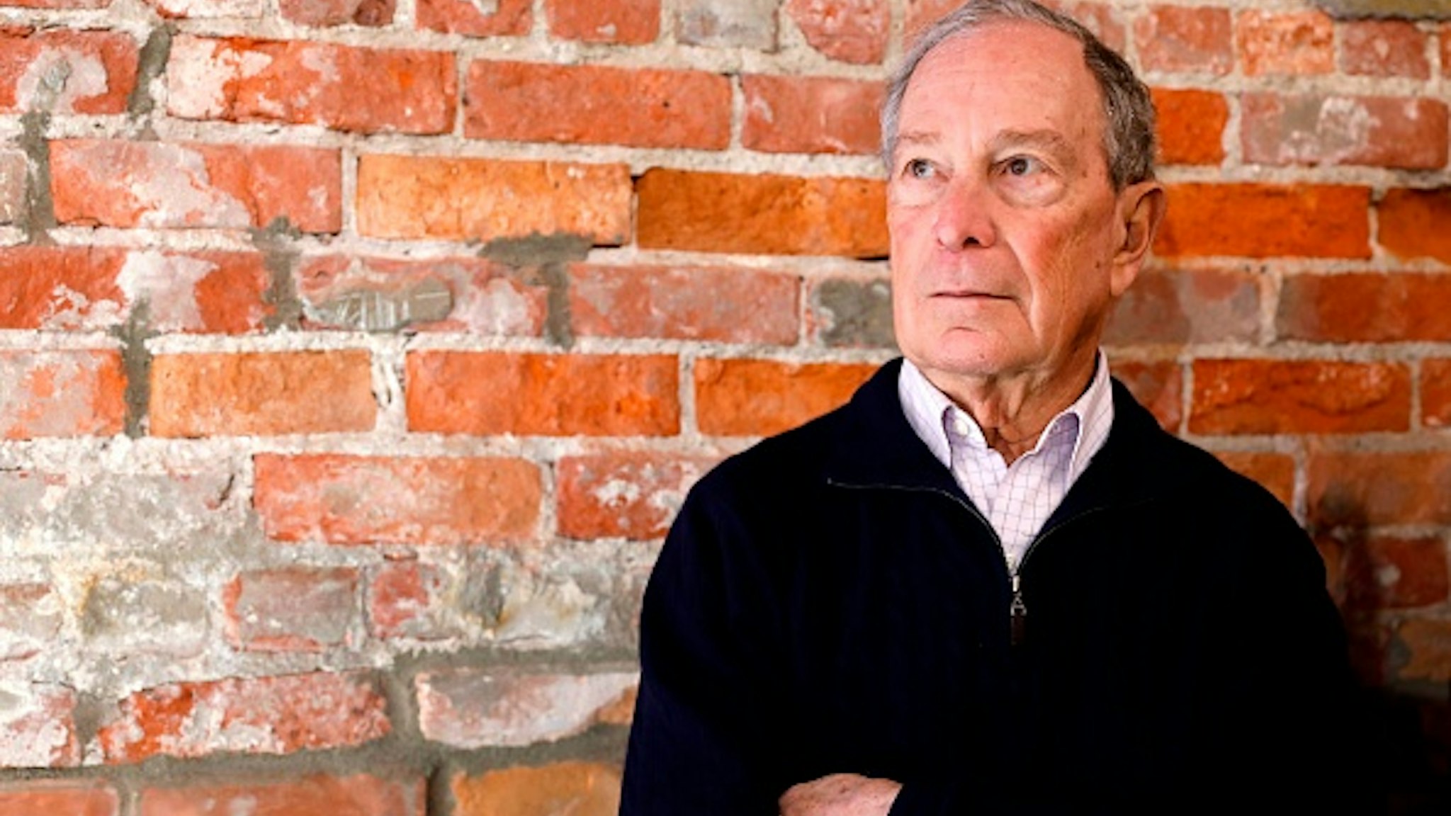2020 Democratic presidential hopeful and former New York Mayor Michael Bloomberg poses for a photo during an event to open a campaign office at Eastern Market in Detroit, Michigan, on December 21, 2019.