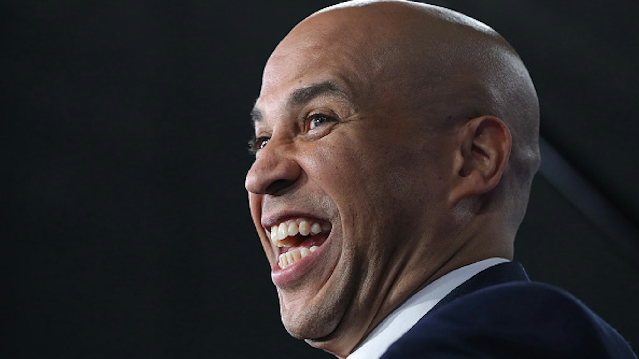 ATLANTA, GEORGIA - NOVEMBER 20: Sen. Cory Booker (D-NJ) laughs during a television interview after the Democratic Presidential Debate at Tyler Perry Studios November 20, 2019 in Atlanta, Georgia. Ten Democratic presidential hopefuls were chosen from the larger field of candidates to participate in the debate hosted by MSNBC and The Washington Post.