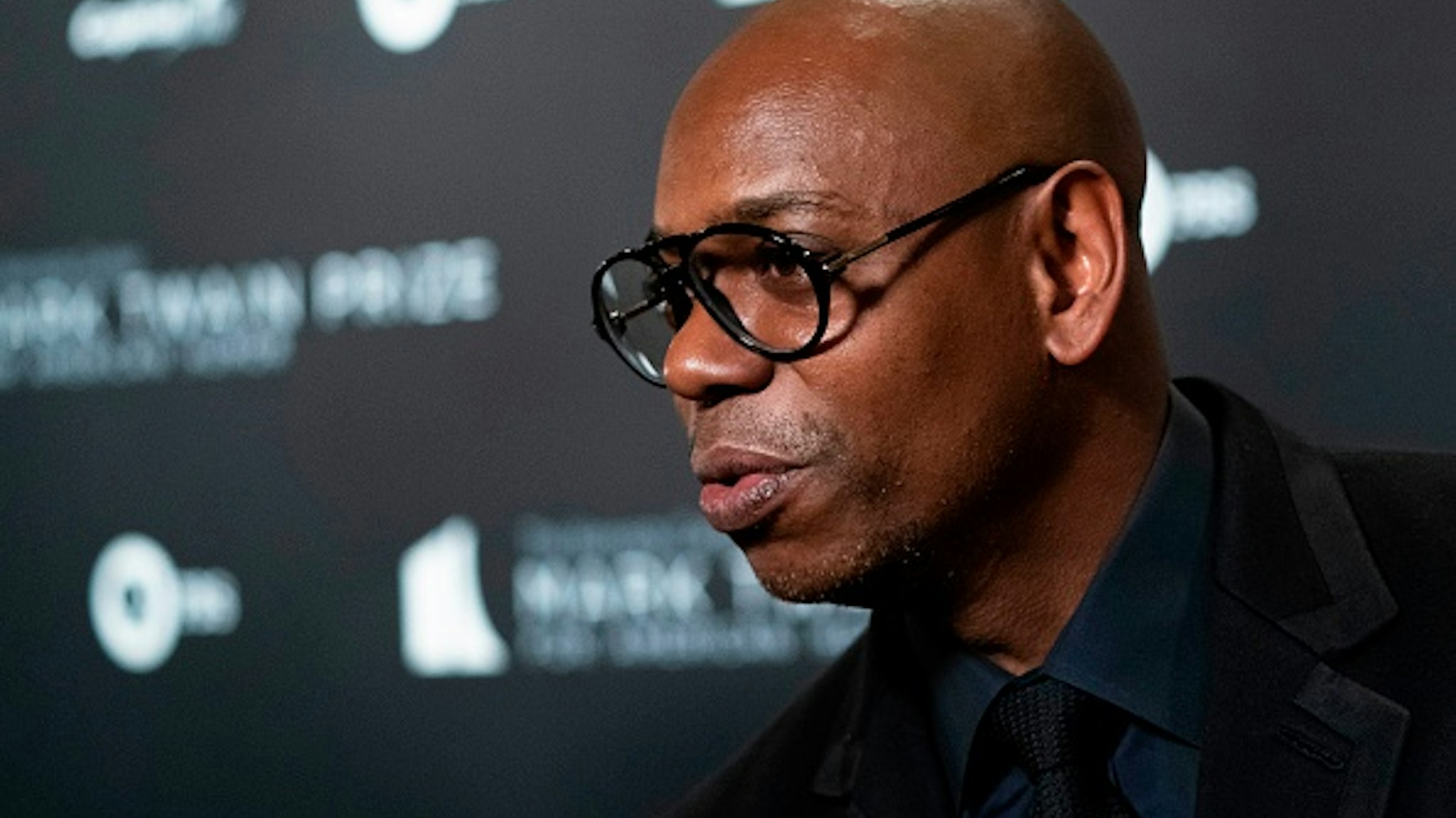 US comedian Dave Chappelle and recipient of the Mark Twain Award for American Humor arrives at the Kennedy Center for award ceremony on October 27, 2019 in Washington, D.C.