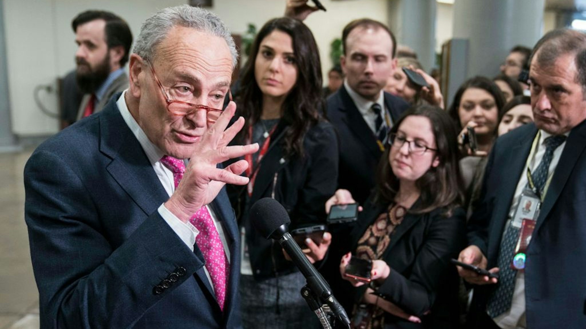 U.S. Minority Leader Chuck Schumer (D-NY) speaks to reporters near the Senate subway during a dinner break on the first day that senators have the opportunity to ask questions during impeachment proceedings against U.S. President Donald Trump on January 29, 2020 at the U.S. Capitol in Washington, DC. (Photo by Sarah Silbiger/Getty Images)