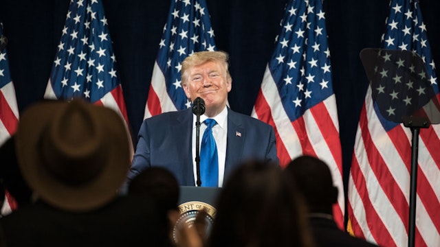 U.S. President Donald Trump pauses while speaking during the 'Black Voices for Trump' launch event in Atlanta, Georgia, U.S., on Friday, Nov. 8, 2019. Monday, January 20, 2020, marks the third anniversary of U.S. President Donald Trump's inauguration. Our editors select the best archive images looking back over Trump’s term in office. Photographer: Dustin Chambers/Bloomberg