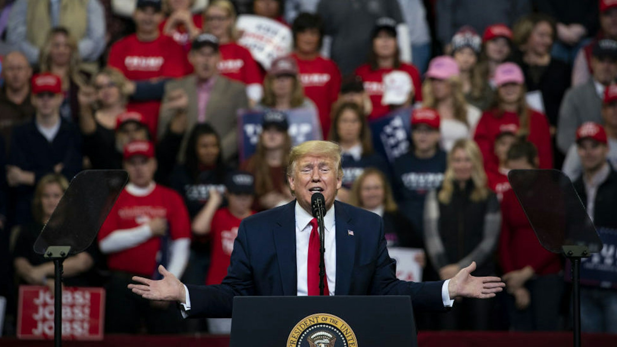 U.S. President Donald Trump speaks during a rally in Des Moines, Iowa, U.S., on Thursday, Jan. 30, 2020. Trump and Democratic presidential hopeful Michael Bloomberg on Thursday unveiled dueling multimillion-dollar campaign ads that are scheduled to air during the Super Bowl on Sunday. Photographer: Al Drago/Bloomberg