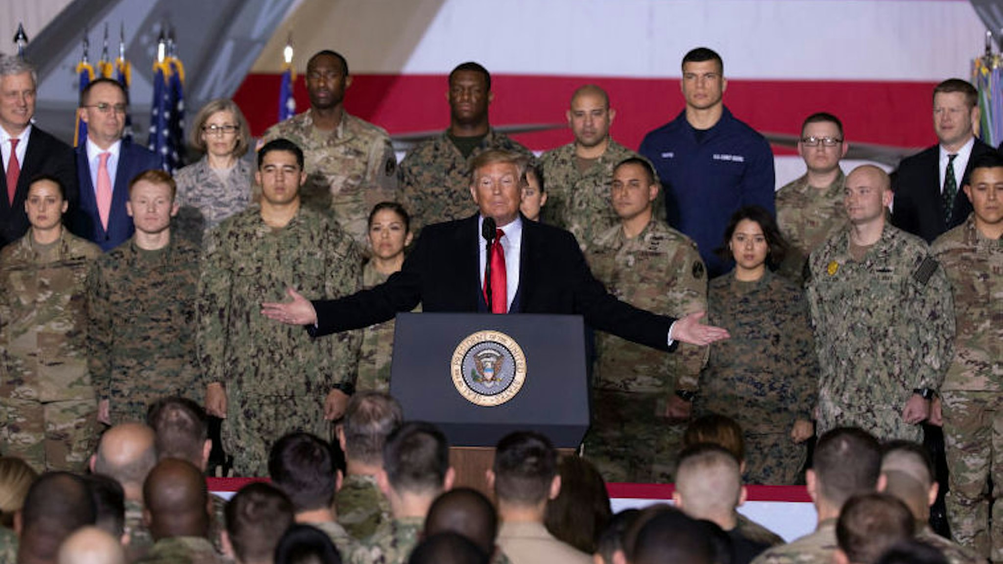 US President Donald Trump speaks at the signing ceremony for S.1709, The National Defense Authorization Act for Fiscal Year 2020 on December 20, 2019 in Joint Base Andrews, Maryland. President Trump is headed to Florida for the Holidays after a historic impeachment vote on the house floor this week. (Photo by Tasos Katopodis/Getty Images)