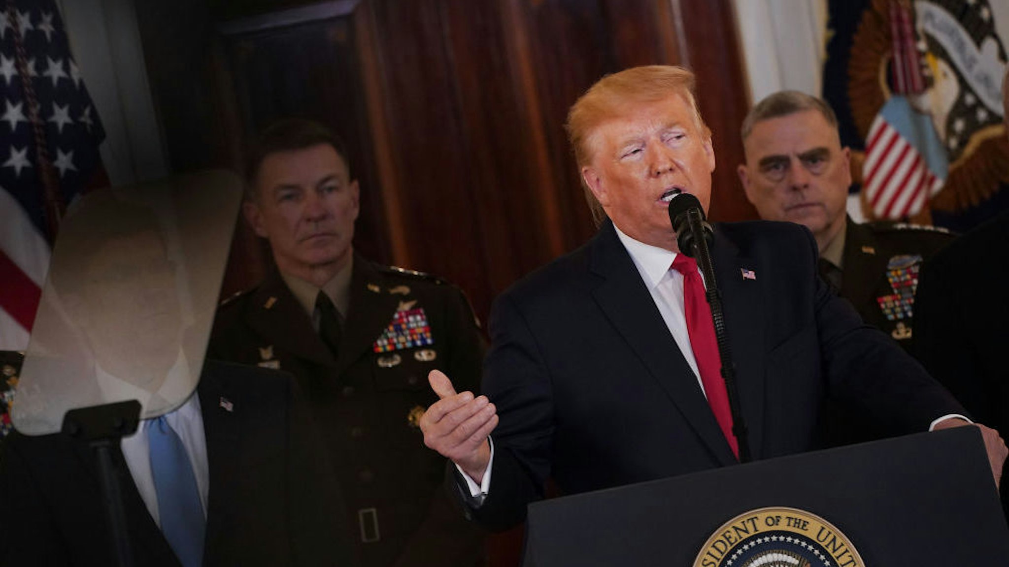 U.S. President Donald Trump speaks in the Grand Foyer of the White House in Washington, D.C., U.S., on Wednesday, Jan. 8, 2020. Iran apparently intended to avoid U.S. casualties when it launched more than a dozen missiles at U.S.-Iraqi airbases in retaliation for an American airstrike that killed a top Iranian general, according to U.S. officials with knowledge of the matter. Photographer: Andrew Harrer/Bloomberg