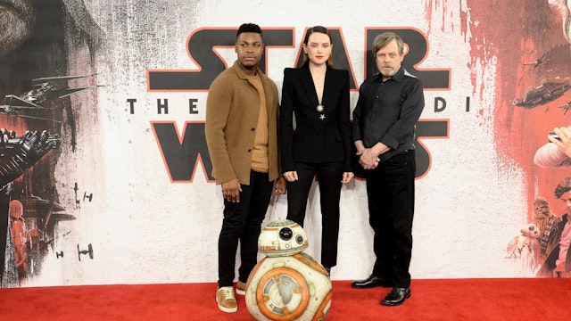 John Boyega, Daisy Ridley and Mark Hamill attend the 'Star Wars: The Last Jedi' photocall at Corinthia Hotel London on December 13, 2017 in London, England.