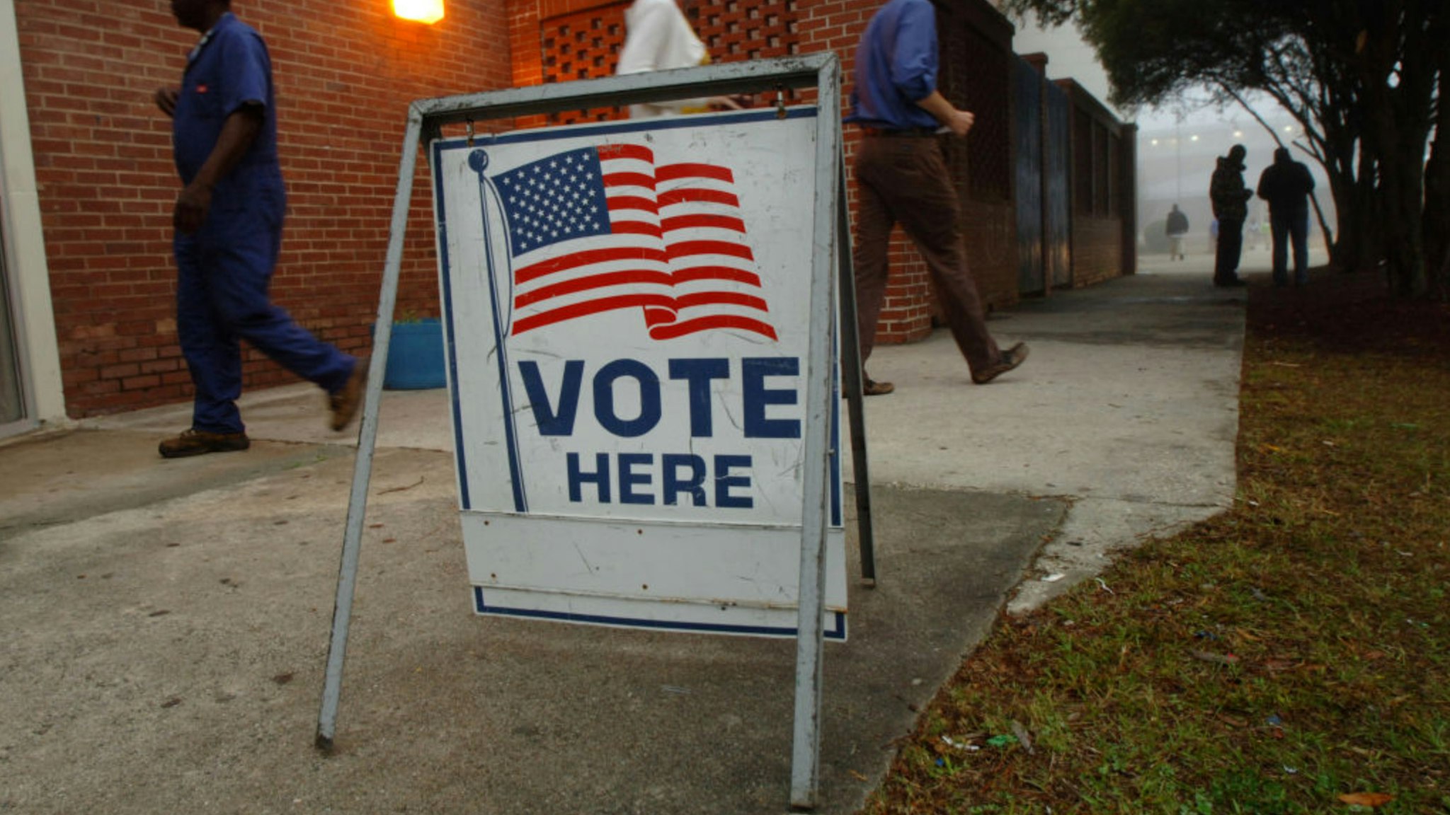 Voters leave a precinct after casting their ballots during Georgia's primary Super Tuesday's presidential election January 5, 2008 in Savannah, Georgia.