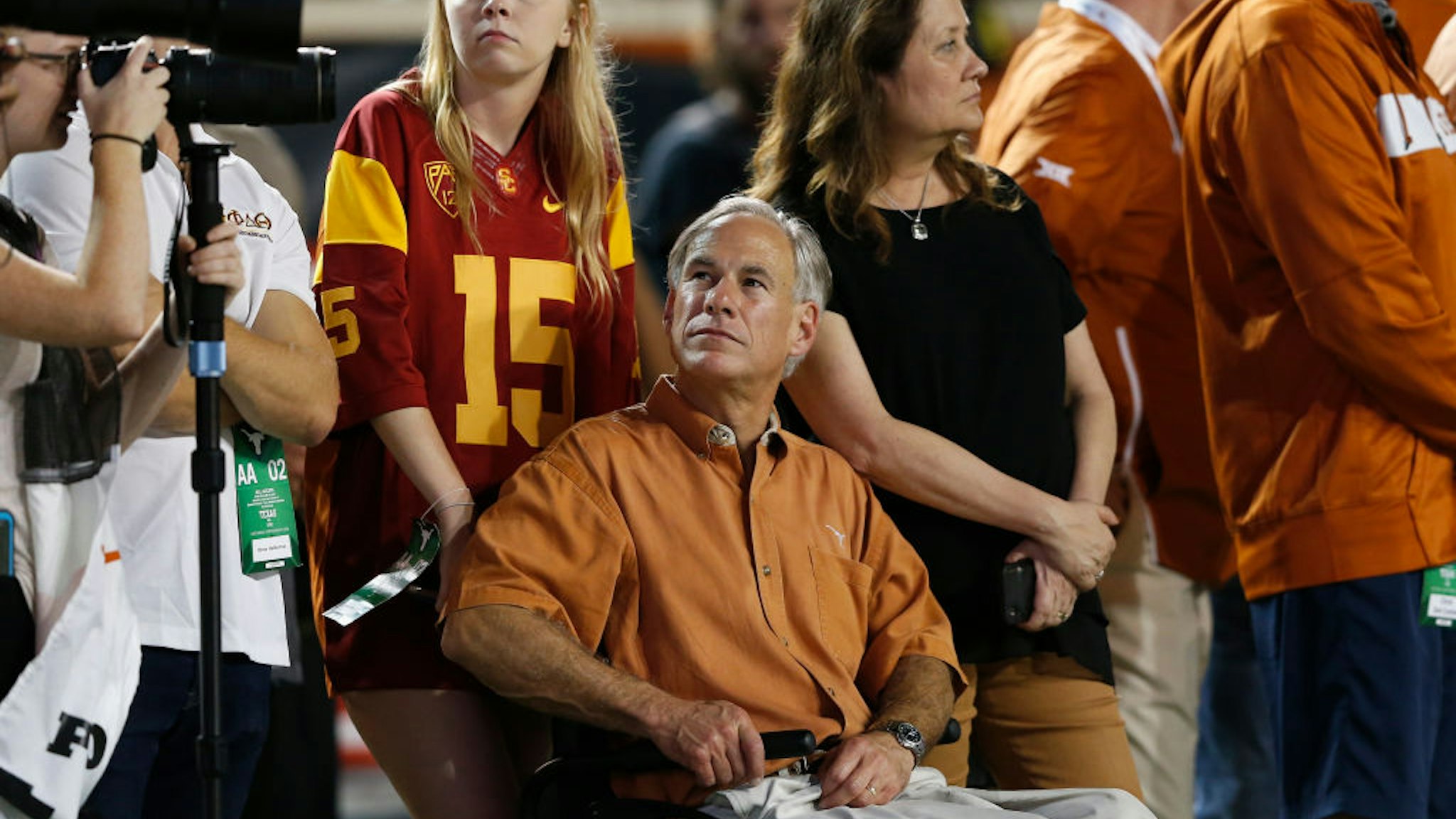 Texas Governor Greg Abbott watches from the sideline in the second half of the game between the Texas Longhorns and the USC Trojans at Darrell K Royal-Texas Memorial Stadium on September 15, 2018 in Austin, Texas.