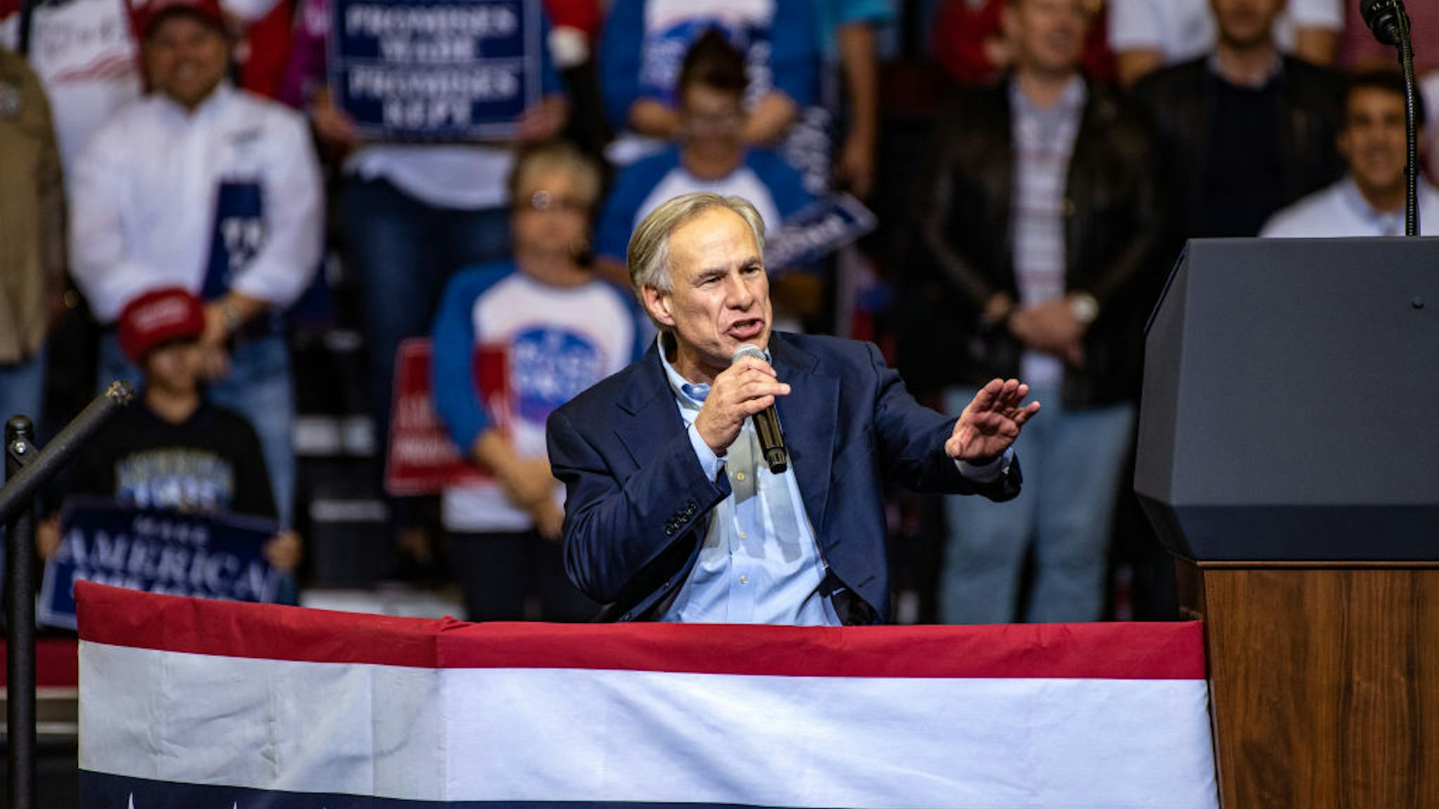 Greg Abbott, governor of Texas, speaks during a campaign rally with U.S. President Donald Trump for Senator Ted Cruz, not pictured, in Houston, Texas, U.S., on Monday, Oct. 22, 2018.