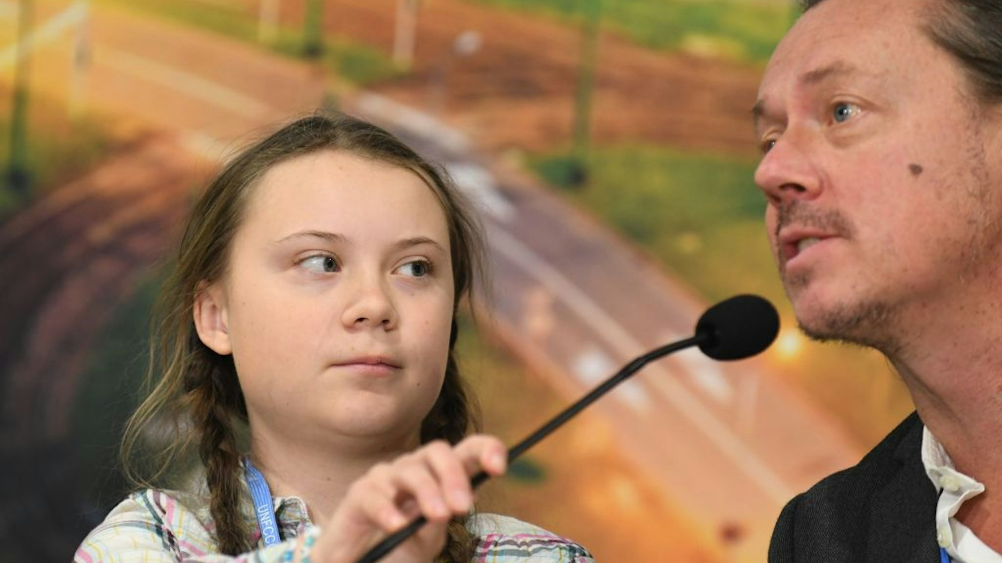 Swedish 15-year old climate activist, Greta Thunberg and her father Svante attend a press conference during the COP24 summit on climate change in Katowice, Poland, on December 04, 2018.