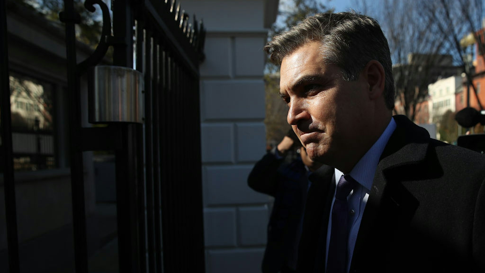 CNN White House correspondent Jim Acosta arrives at the White House gate as he returns to work following a court ruling restoring his ability to report from the White House on November 16, 2018 in Washington, DC.