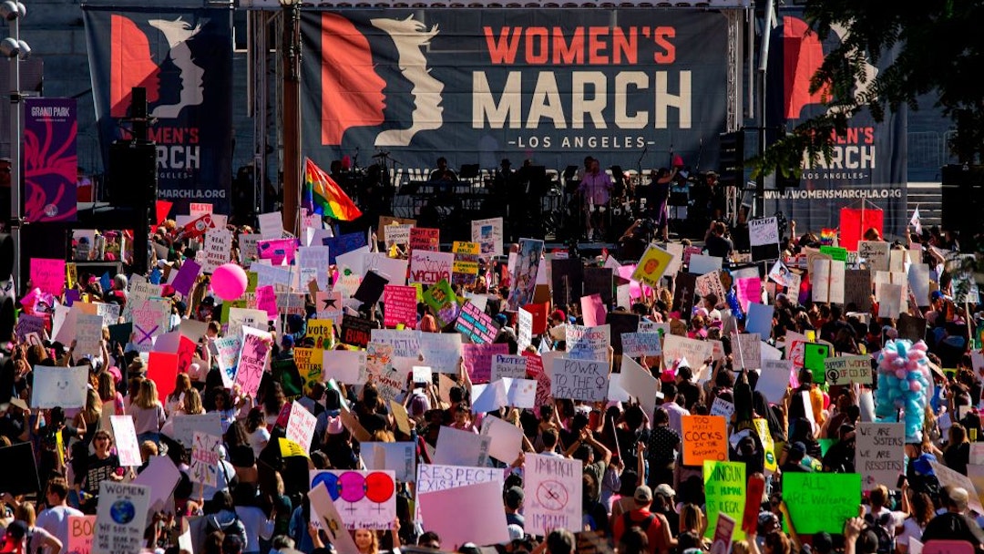 People rally at the Third Annual Women's March LA in downtown Los Angeles, California on January 19, 2019.