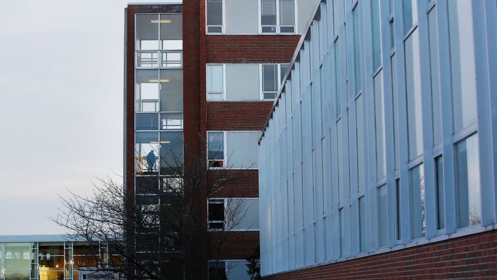 University of Southern Maine campus A person walks up a stairwell in the Luther Bonney Hall at University of Southern Maine campus.