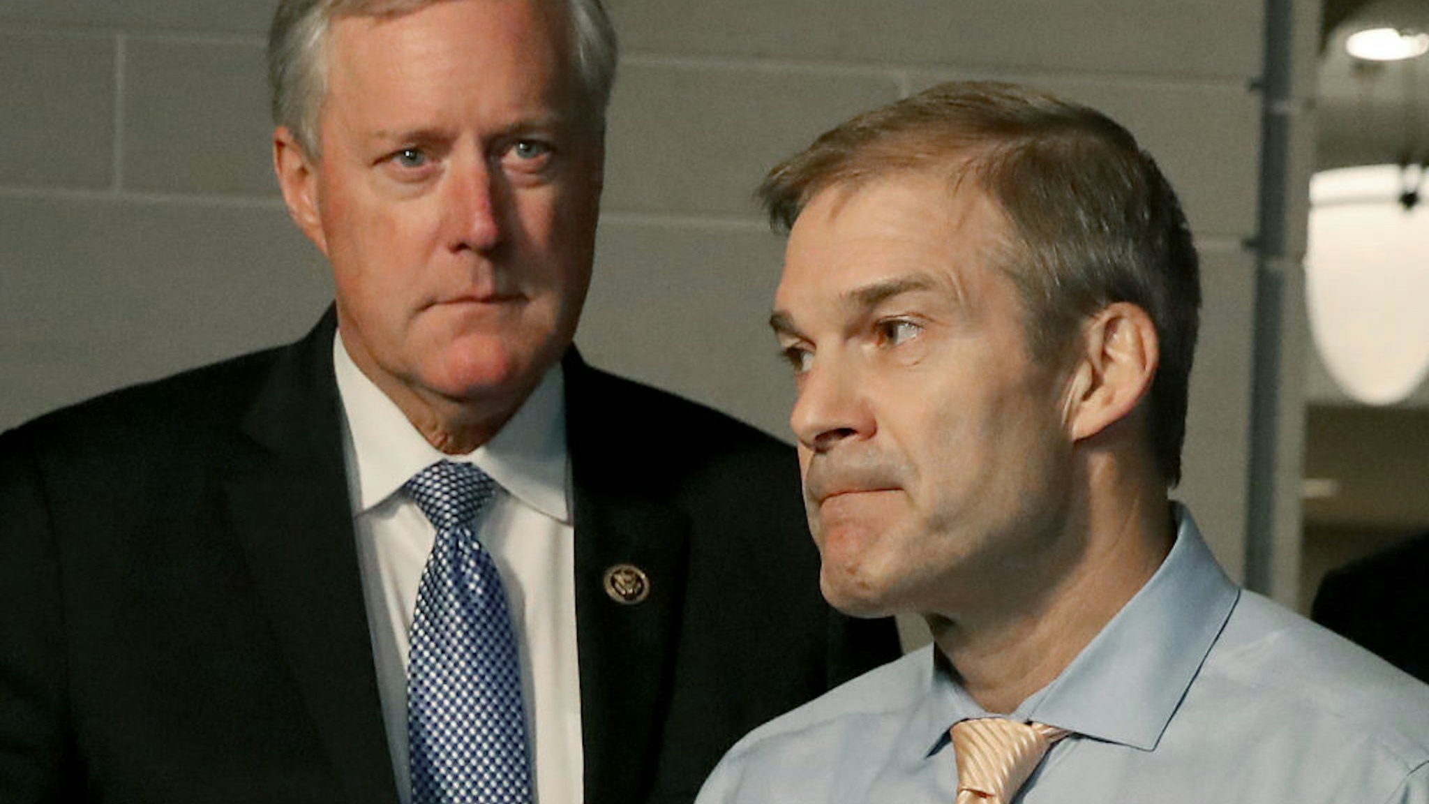 Rep. Jim Jordan (R-OH) (R) and Rep. Mark Meadows (R-NC) speak to the media during a break in a closed door House Intelligence Committee meeting where former US Special Envoy for Ukraine Kurt Volker is being interviewed at the U.S. Capitol October 03, 2019 in Washington, DC.
