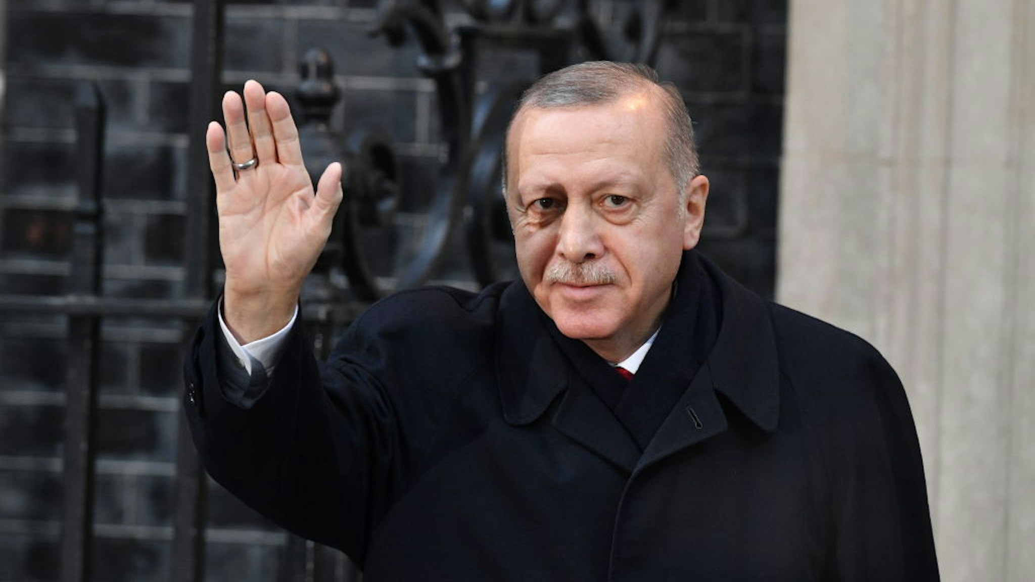 LONDON, ENGLAND - DECEMBER 03: President of Turkey, Recep Tayyip Erdogan arrives for a meeting with Prime Minister Boris Johnson at number 10 Downing Street on December 3, 2019 in London, England. France and the UK signed the Treaty of Dunkirk in 1947 in the aftermath of WW2 cementing a mutual alliance in the event of an attack by Germany or the Soviet Union. The Benelux countries joined the Treaty and in April 1949 expanded further to include North America and Canada followed by Portugal, Italy, Norway, Denmark and Iceland. This new military alliance became the North Atlantic Treaty Organisation (NATO). The organisation grew with Greece and Turkey becoming members and a re-armed West Germany was permitted in 1955. This encouraged the creation of the Soviet-led Warsaw Pact delineating the two sides of the Cold War. This year marks the 70th anniversary of NATO.