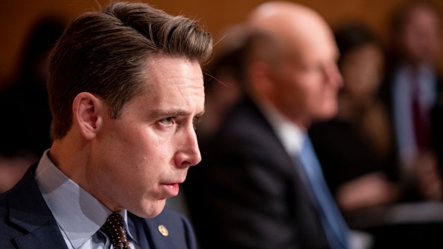 WASHINGTON, DC - DECEMBER 18: Sen. Josh Hawley (R-MO) listens as Department of Justice Inspector General Michael Horowitz testifies before the Senate Committee On Homeland Security And Governmental Affairs during a hearing at the US Capitol on December 18, 2019 in Washington, DC. Last week the Inspector General released a report on the origins of the FBI's investigation into the Trump campaign's possible ties with Russia during the 2016 Presidential elections.