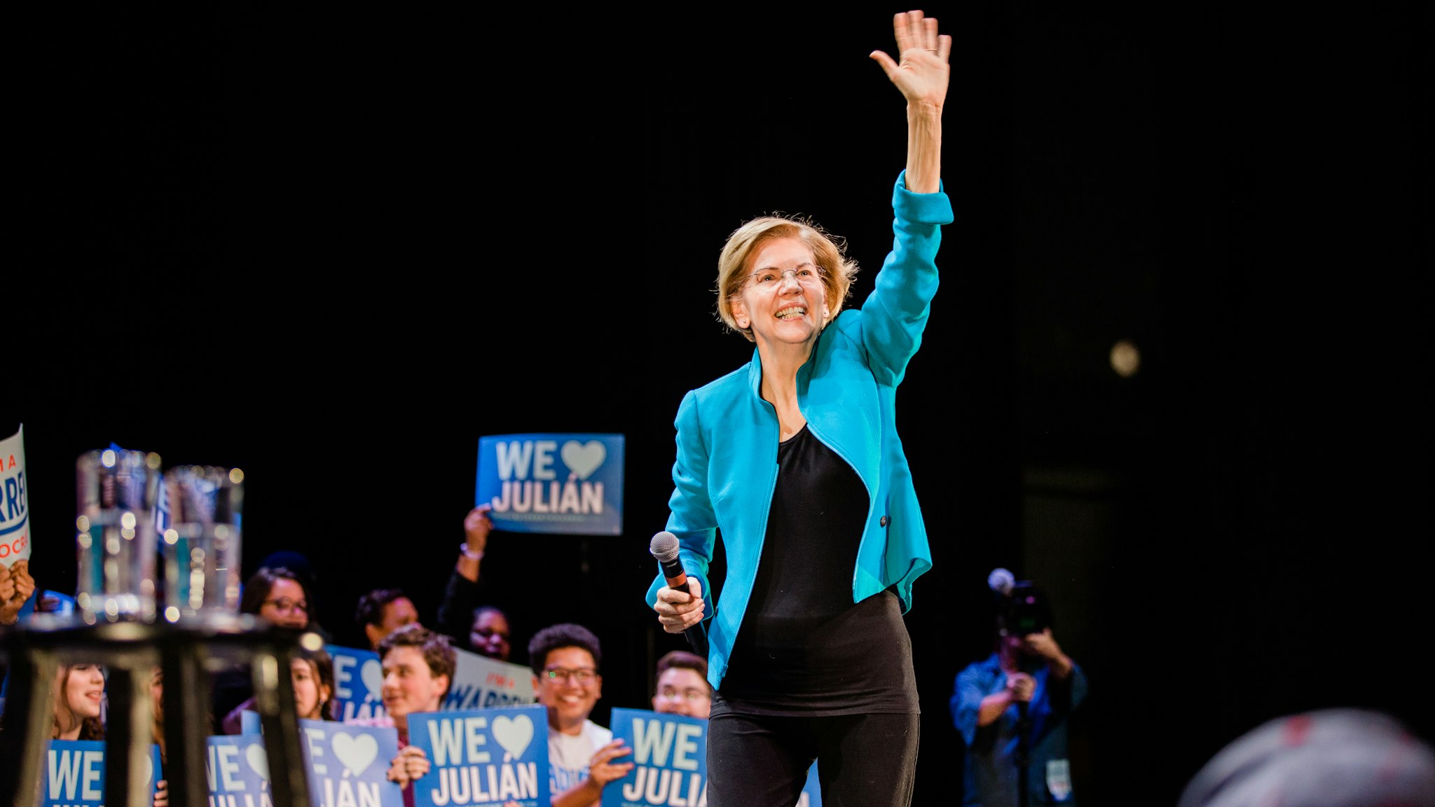 Senator Elizabeth Warren, a Democrat from Massachusetts and 2020 presidential candidate, waves to attendees during a campaign event in the Brooklyn Borough of New York, U.S., on Tuesday, Jan. 7, 2020. Warren rolled out a plan Tuesday to restore bankruptcy protections repealed in a 2005 law championed by Joe Biden, taking an implicit shot at the Democratic presidential front-runner just weeks before the first nominating contests next month. Photographer: Gabriela Bhaskar/Bloomberg via Getty Images