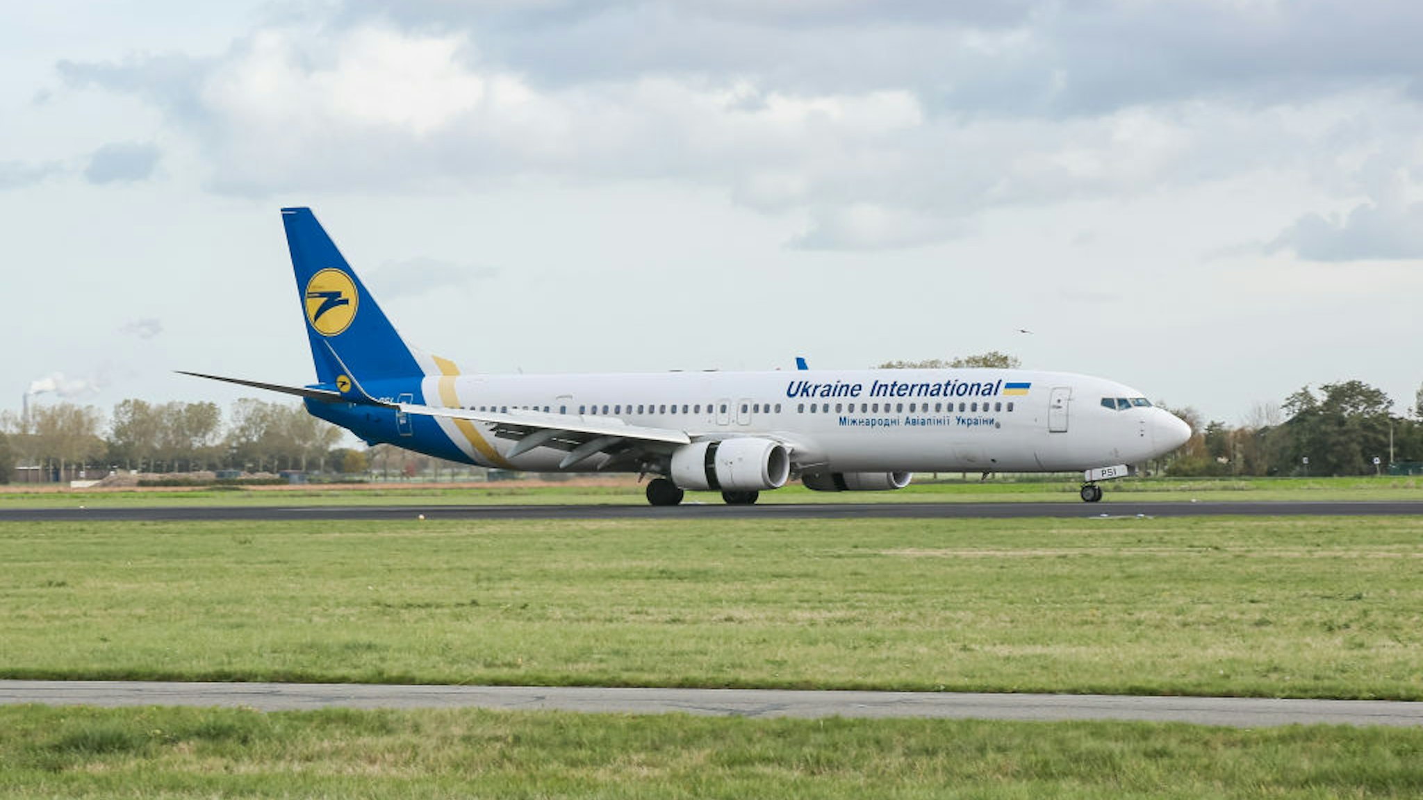 Ukraine International Airlines UIA Boeing 737 aircraft as seen landing at Amsterdam Schiphol AMS EHAM Airport.