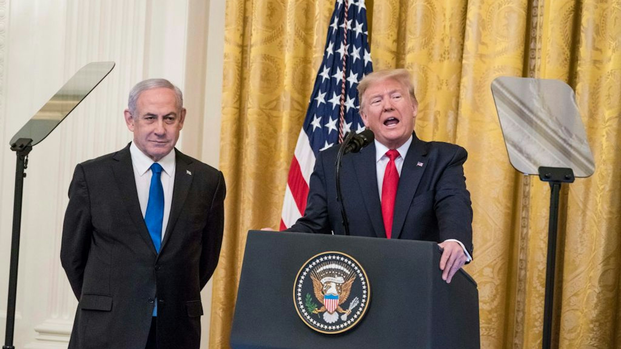 U.S. President Donald Trump and Israeli Prime Minister Benjamin Netanyahu participate in a joint statement in the East Room of the White House on January 28, 2020 in Washington, DC.