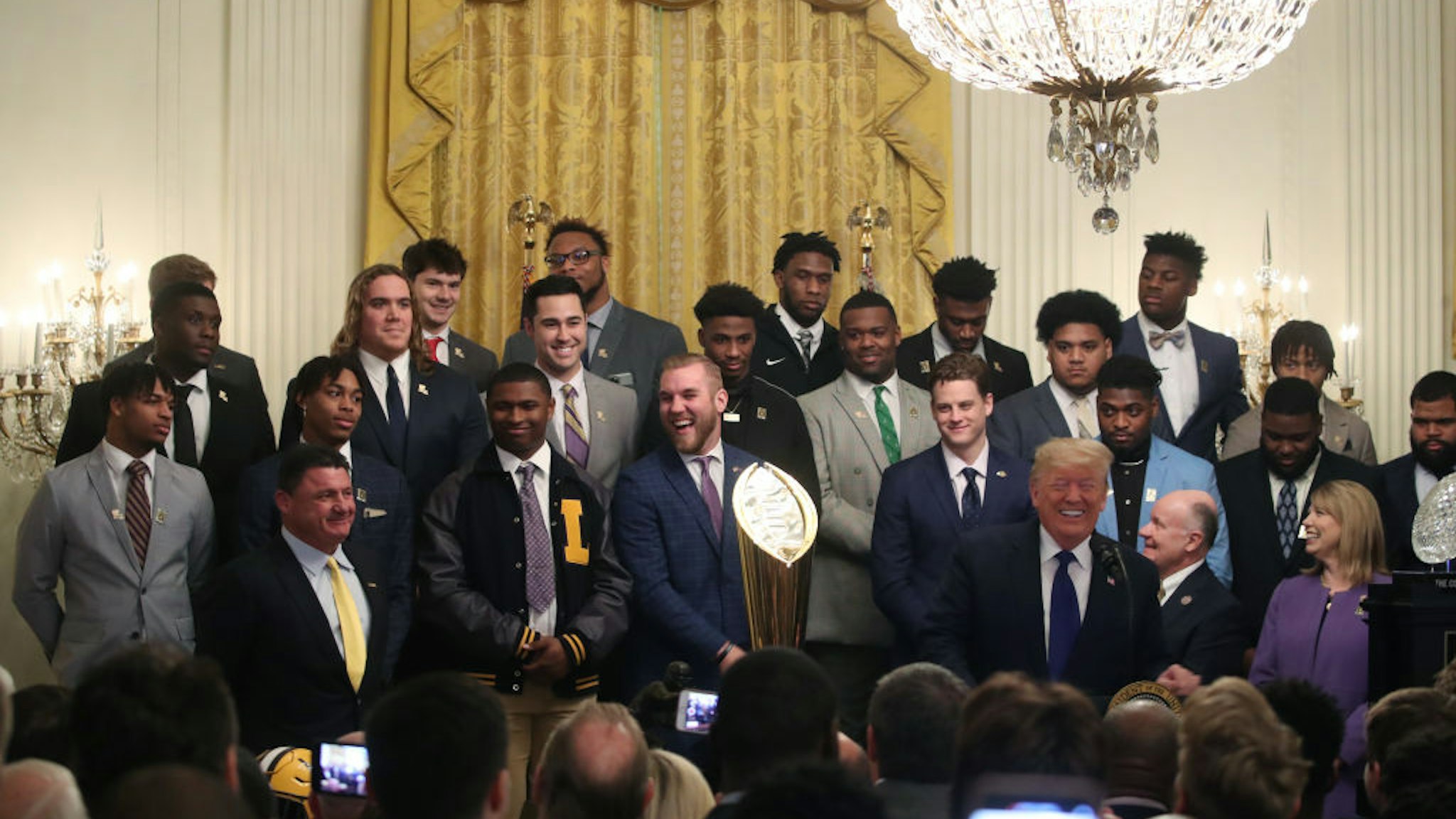 U.S. President Donald Trump welcomes the Louisiana State University football team in the East Room at the White House, on January 17, 2020 in Washington, DC.