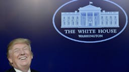 President Trump Hosts CEO Town Hall On America Business Climate At White House U.S. President Donald Trump laughs during a town hall meeting with executives on the America business climate in the South Court Auditorium of the White House in Washington, D.C., U.S., on Tuesday, April 4, 2017.