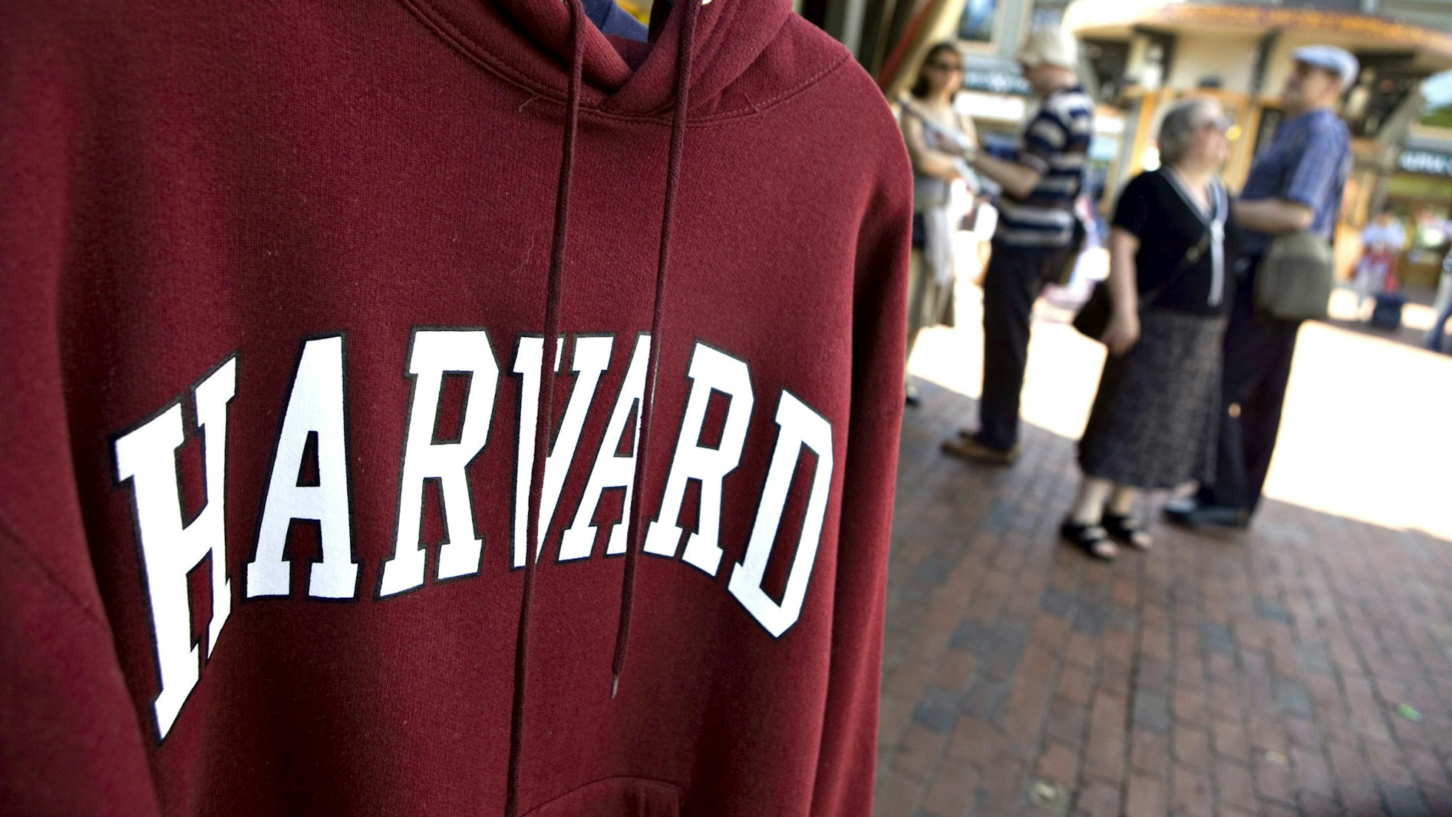 UNITED STATES - SEPTEMBER 03: A Harvard University logo appears on a sweatshirt on display in Harvard Square in Cambridge, Massachusetts, U.S., on Friday, Sept. 4, 2009.