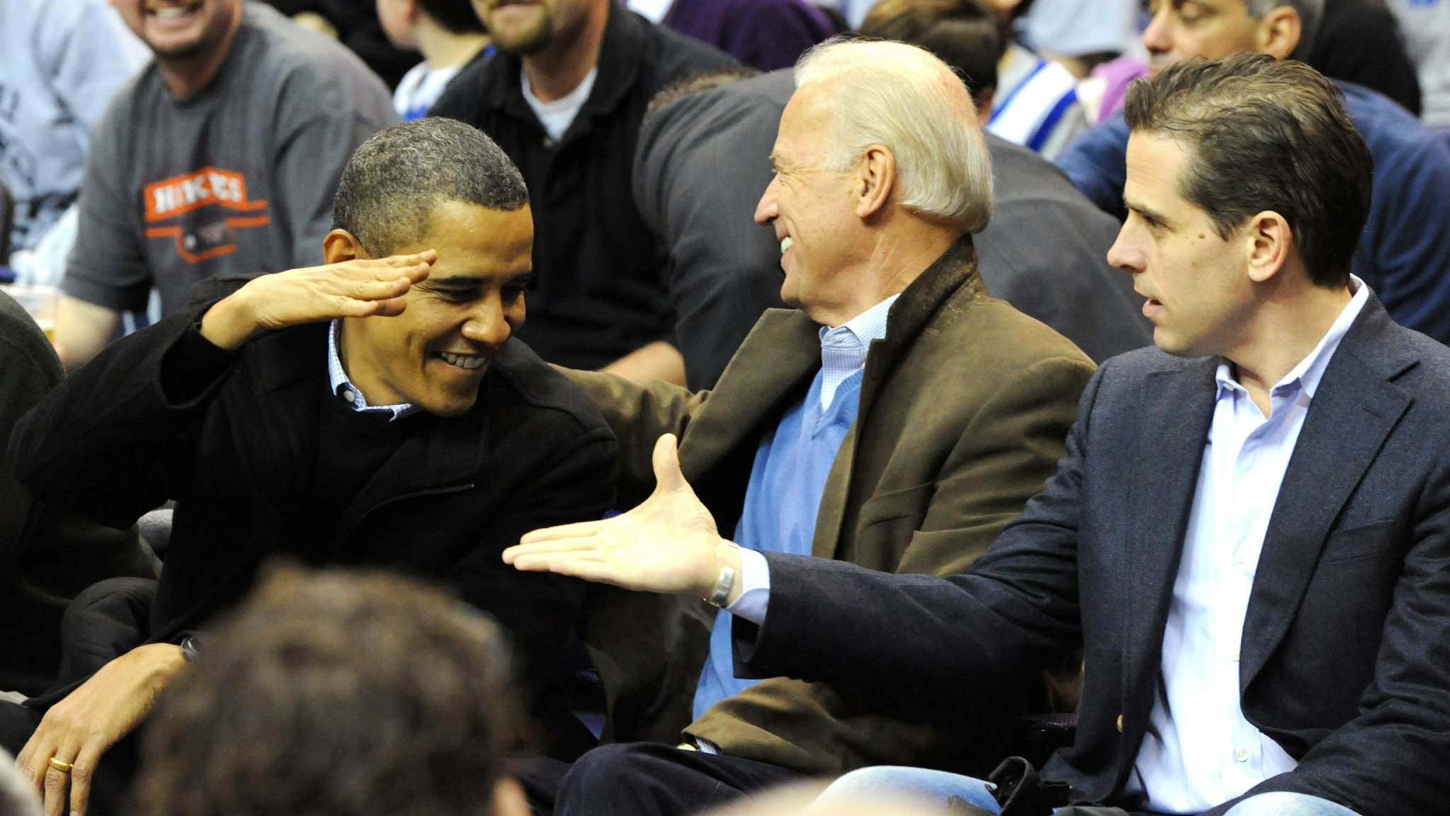 WASHINGTON - JANUARY 30: (AFP OUT) U.S. President Barack Obama (L) greets Vice President Joe Biden (C) and his son Hunter Biden as they attend the game between the Duke Blue Devils and Georgetown Hoyas on January 30, 2010 at the Verizon Center in Washington, DC.
