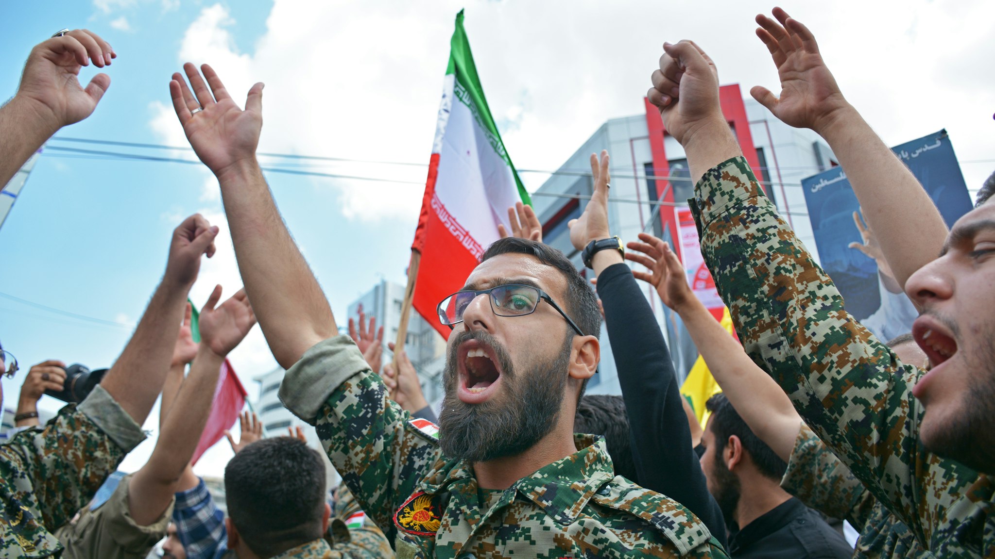 A group of members of Basij paramilitary force, affiliated to the Revolutionary Guard, chant slogan during the annual Quds, or Jerusalem Day rally in Tehran, Iran, Friday, May 31, 2019.