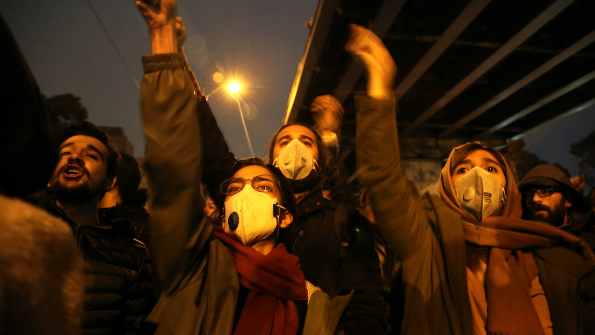 TEHRAN, IRAN - JANUARY 11 : Iranians shout slogans against the government after a vigil held for the victims of the airplane of Ukrainian International Airlines that crashed near Imam Khomeini Airport turned into an anti-government protest outside Amirkabir University in Tehran, Iran on January 11, 2020.