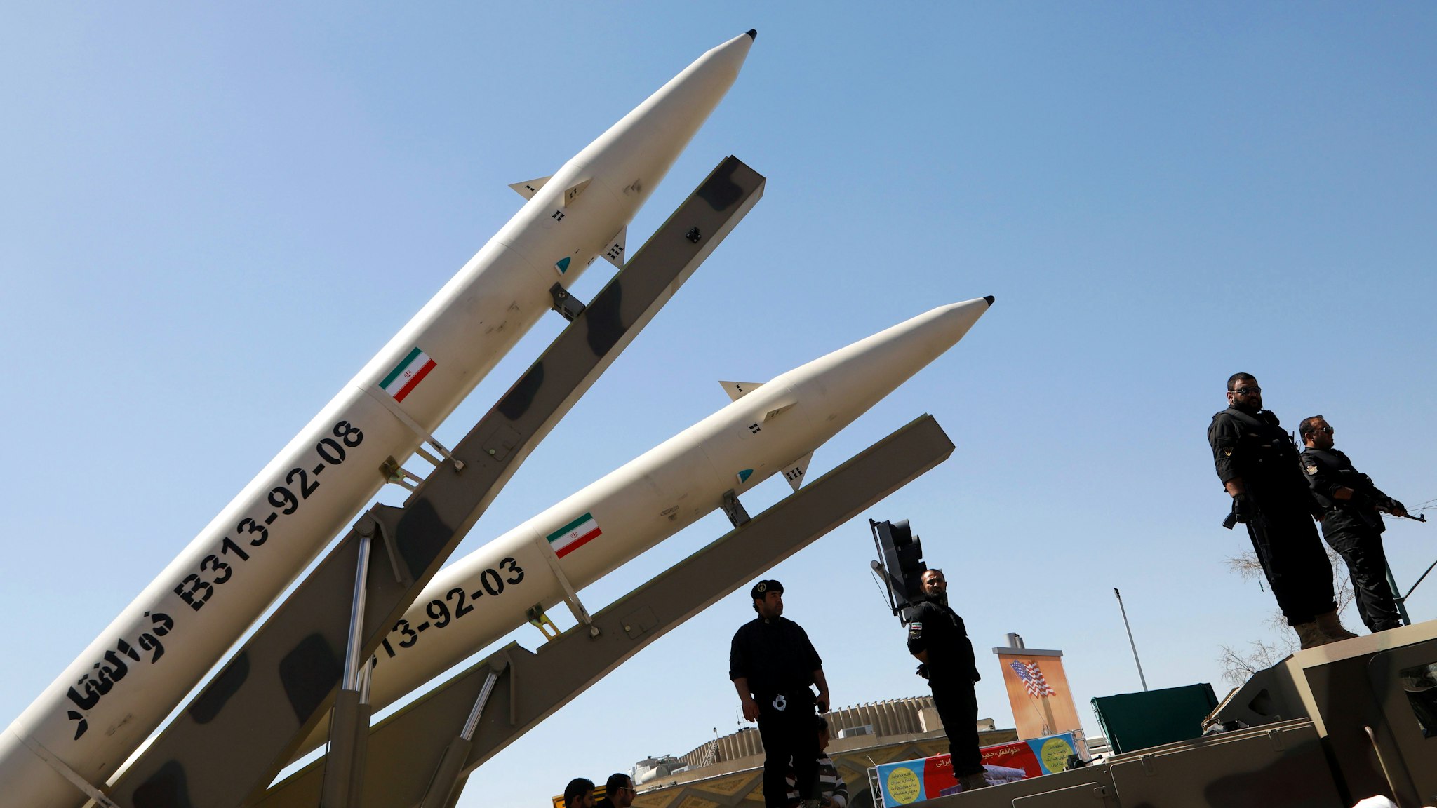 Zolfaghar missiles (R) are displayed during a rally marking al-Quds (Jerusalem) Day in Tehran on June 23, 2017. Chants against the Saudi royal family and the Islamic State group mingled with the traditional cries of "Death to Israel" and "Death to America" at Jerusalem Day rallies across Iran today.