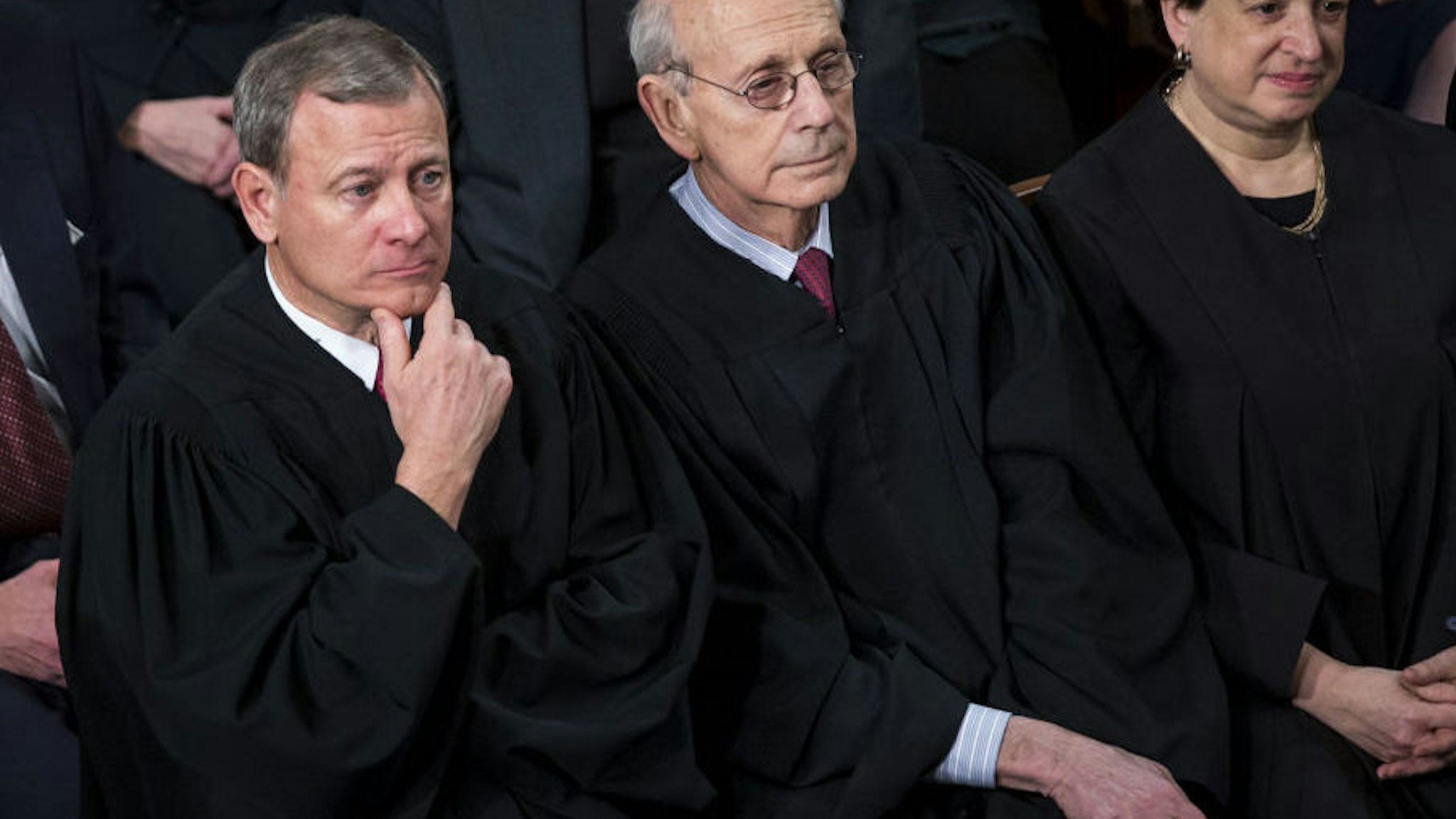 The Supreme Court Justices, from bottom left, Chief Justice John Roberts, Stephen Breyer, and Elena Kagan listen during a State of the Union address to a joint session of Congress at the U.S. Capitol in Washington, D.C., U.S., on Tuesday, Jan. 30, 2018. President Donald Trump sought to connect his presidency to the nation's prosperity in his first State of the Union address, arguing that the U.S. has arrived at a "new American moment" of wealth and opportunity.