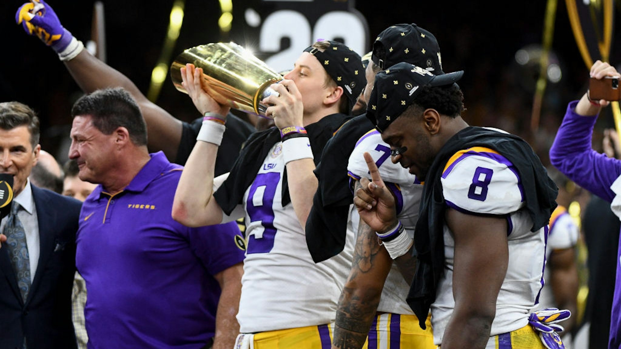 Joe Burrow #9 of the LSU Tigers celebrates after defeating the Clemson Tigers during the College Football Playoff National Championship held at the Mercedes-Benz Superdome on January 13, 2020 in New Orleans, Louisiana. (Photo by Justin Tafoya/Getty Images)