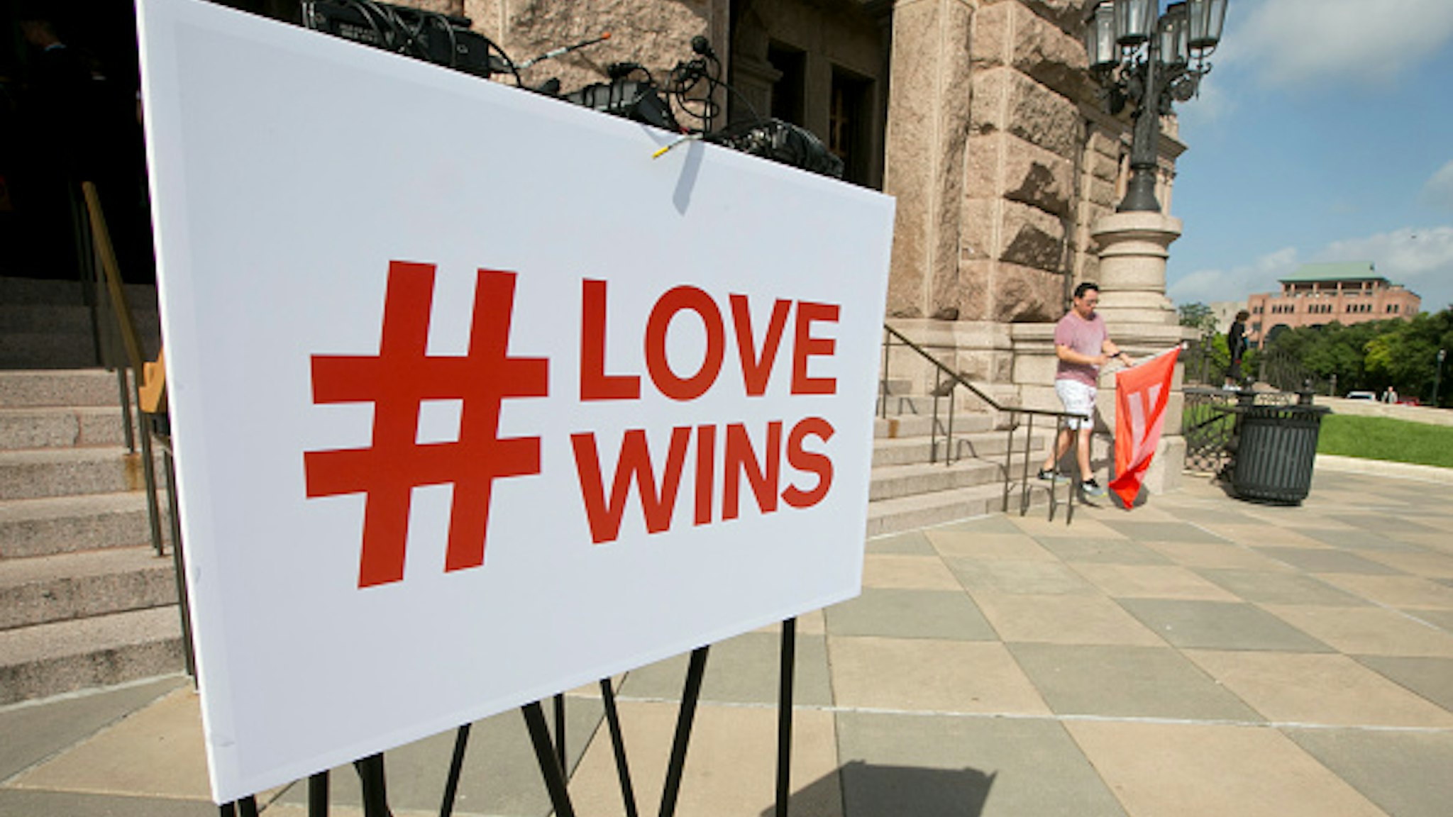 Love Wins sign on podium at the Texas Capitol before a press conference hosted by the Human Rights Campaign celebrating the recent SCOTUS ruling on marriage equality