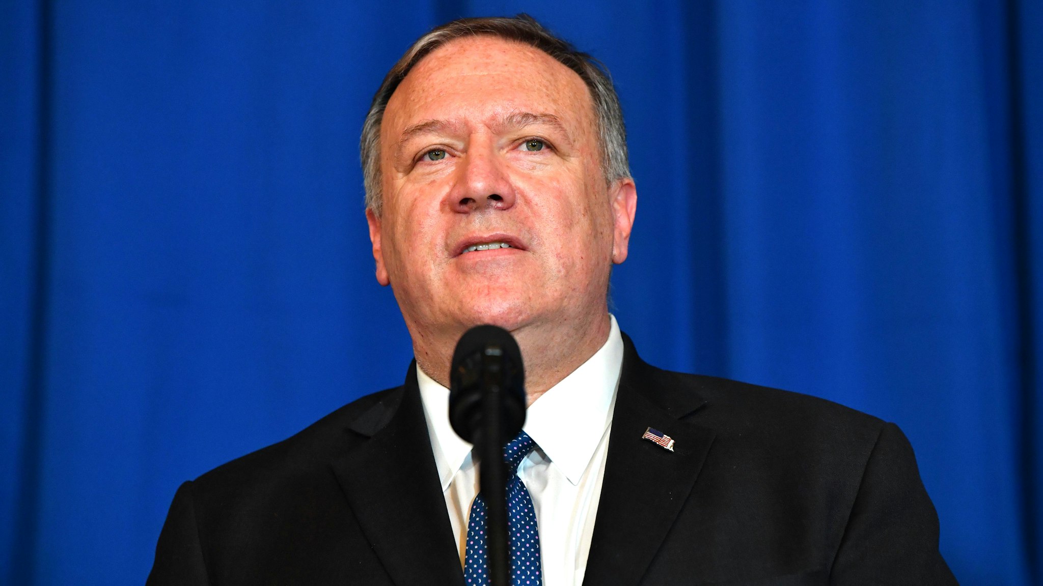 US Secretary of State Mike Pompeo speaks onstage during a briefing on the past 72 hours events in Mar a Lago, Palm Beach, Florida on December 29, 2019. - Pompeo says they came to brief POTUS on events of past 72 hours Pompeo: We will not stand for the Islamic Republic of Iran to take actions that put American men and women in jeopardy.